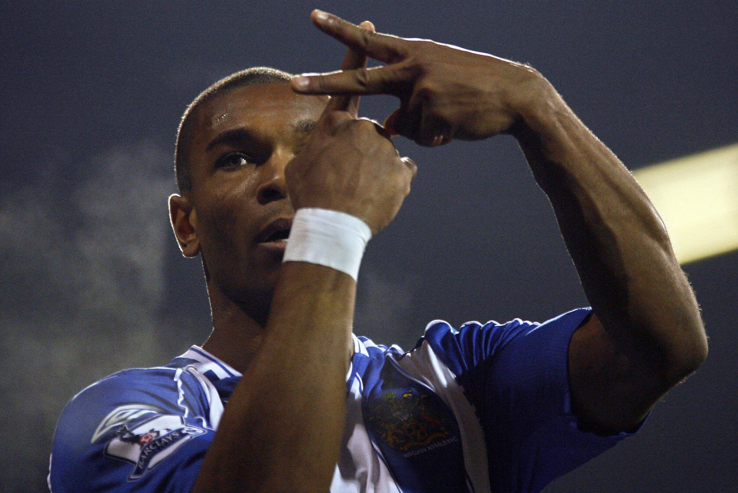 Bent celebrates a Premier League goal for Wigan Athletic in 2007.