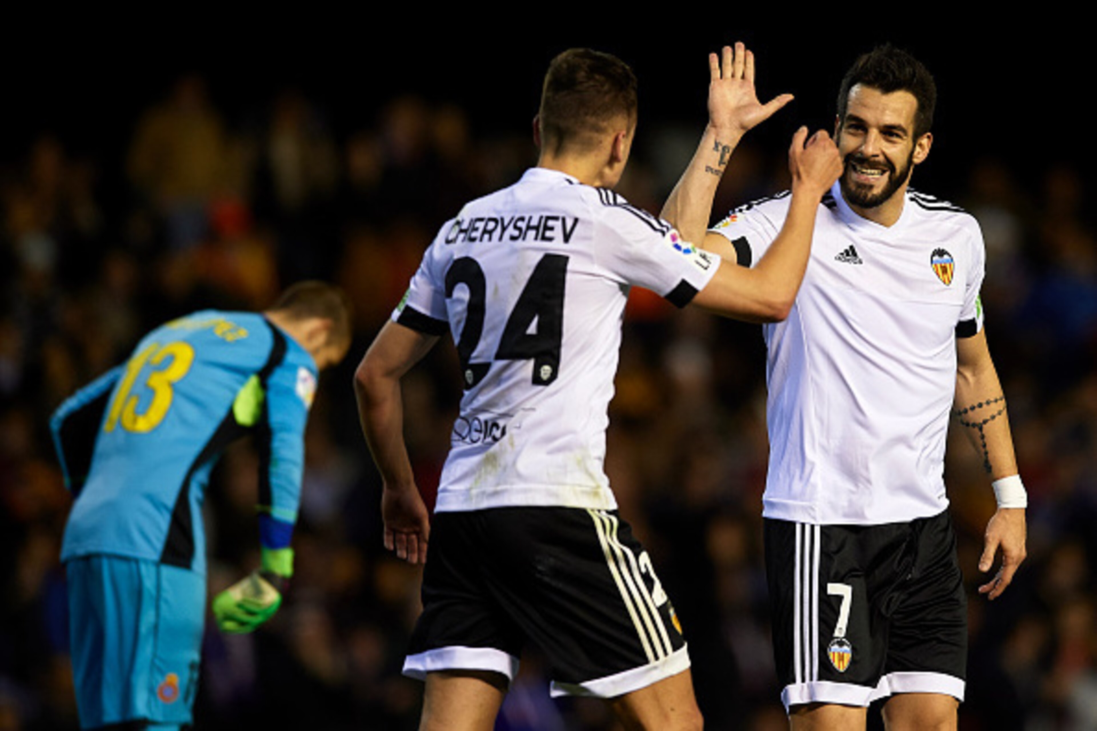 VALENCIA, SPAIN - FEBRUARY 13:  Denis Cheryshev of Valencia celebrates scoring his team's second goal with his teammate Alvaro Negredo during the La Liga match between Valencia CF and RCD Espanyol at Estadi de Mestalla on February 13, 2016 in Valencia, Sp
