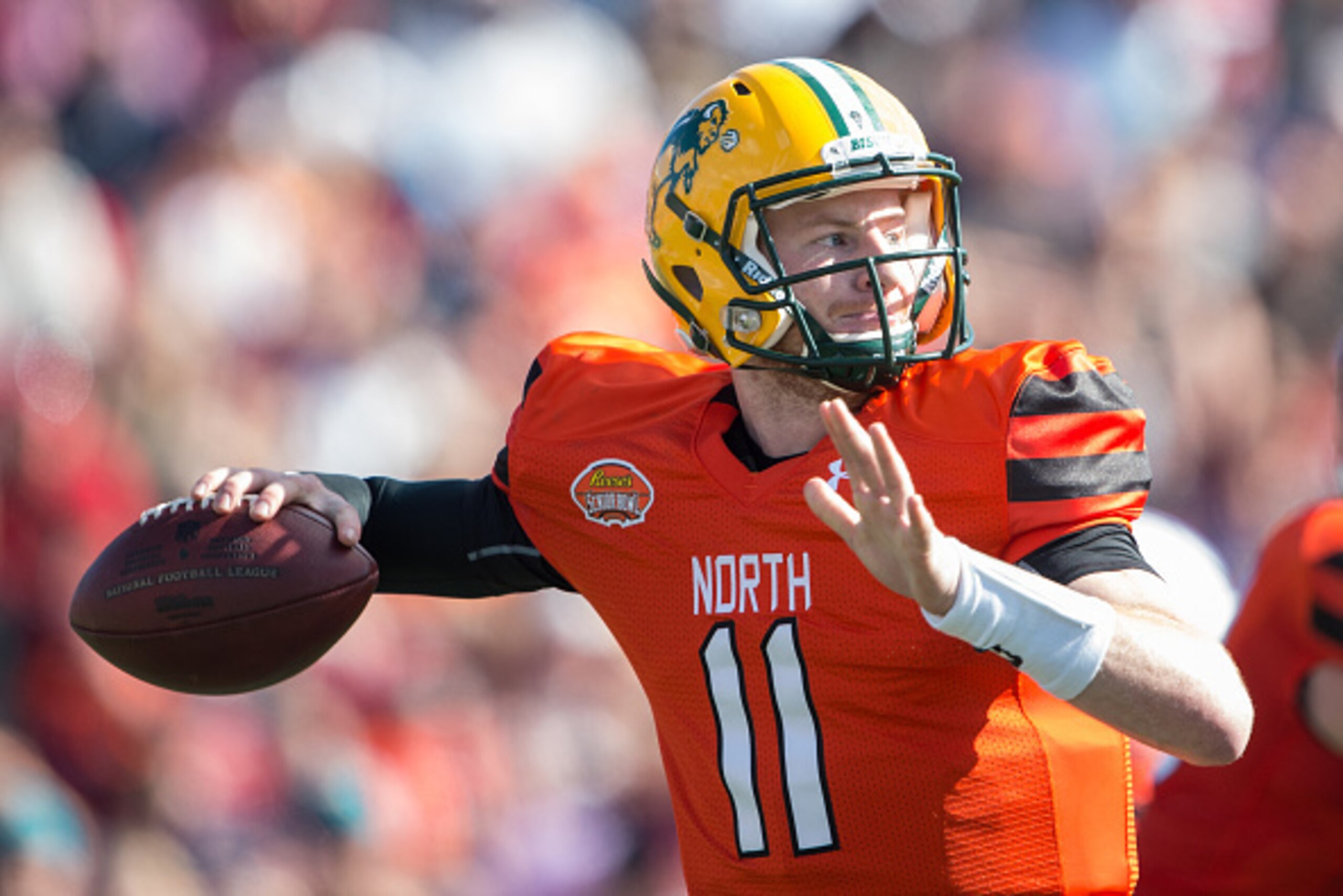 MOBILE, AL - JANUARY 30: North team's quarterback Carson Wentz #11 with North Dakota State looks to throw a pass during their game against the South Team on January 30, 2016 at Ladd-Peebles Stadium in Mobile, Alabama. (Photo by Michael Chang/Getty Images)