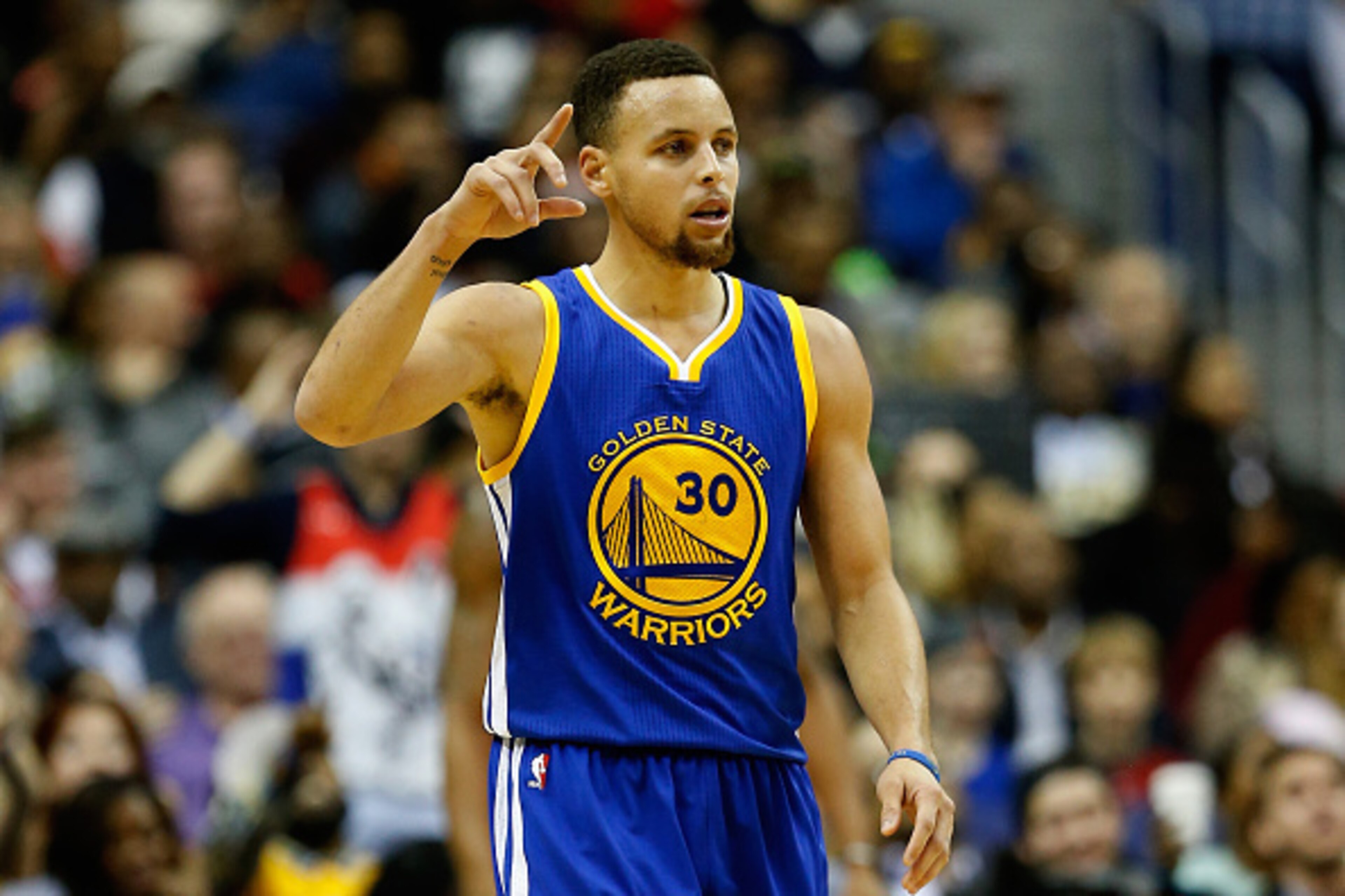 WASHINGTON, DC - FEBRUARY 03:  Stephen Curry #30 of the Golden State Warriors celebrates after scoring in the foiurth quarter against the Washington Wizards at Verizon Center on February 3, 2016 in Washington, DC. The Warriors defeated the Wizards 134 to 