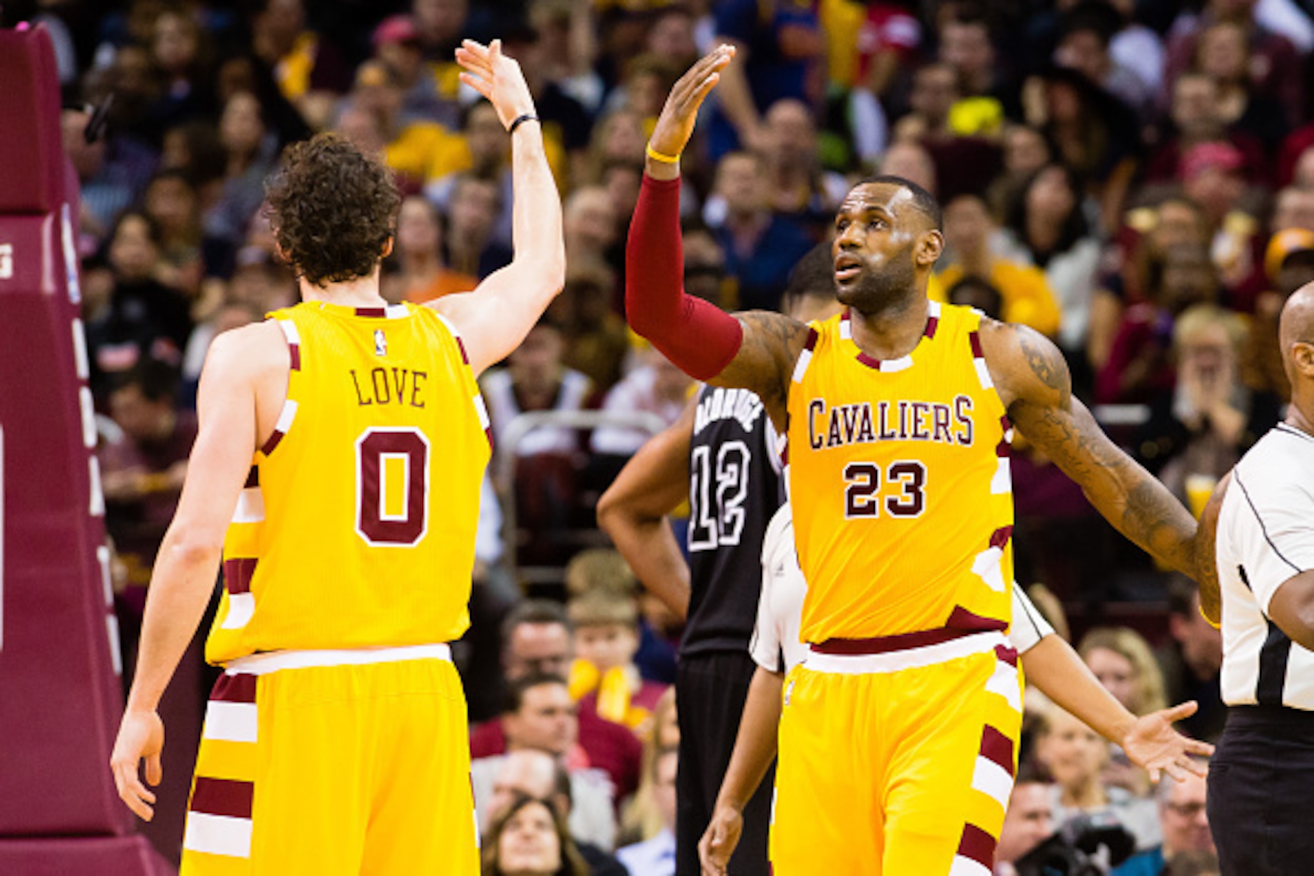CLEVELAND, OH - JANUARY 30: Kevin Love #0 of the Cleveland Cavaliers and LeBron James #23 celebrate during the second half against the San Antonio Spurs at Quicken Loans Arena on January 30, 2016 in Cleveland, Ohio. The Cavaliers defeated the Spurs 117-10 CLEVELAND, OH - JANUARY 30: Kevin Love #0 of the Cleveland Cavaliers and LeBron James #23 celebrate during the second half against the San Antonio Spurs at Quicken Loans Arena on January 30, 2016 in Cleveland, Ohio. The Cavaliers defeated the Spurs 117-10