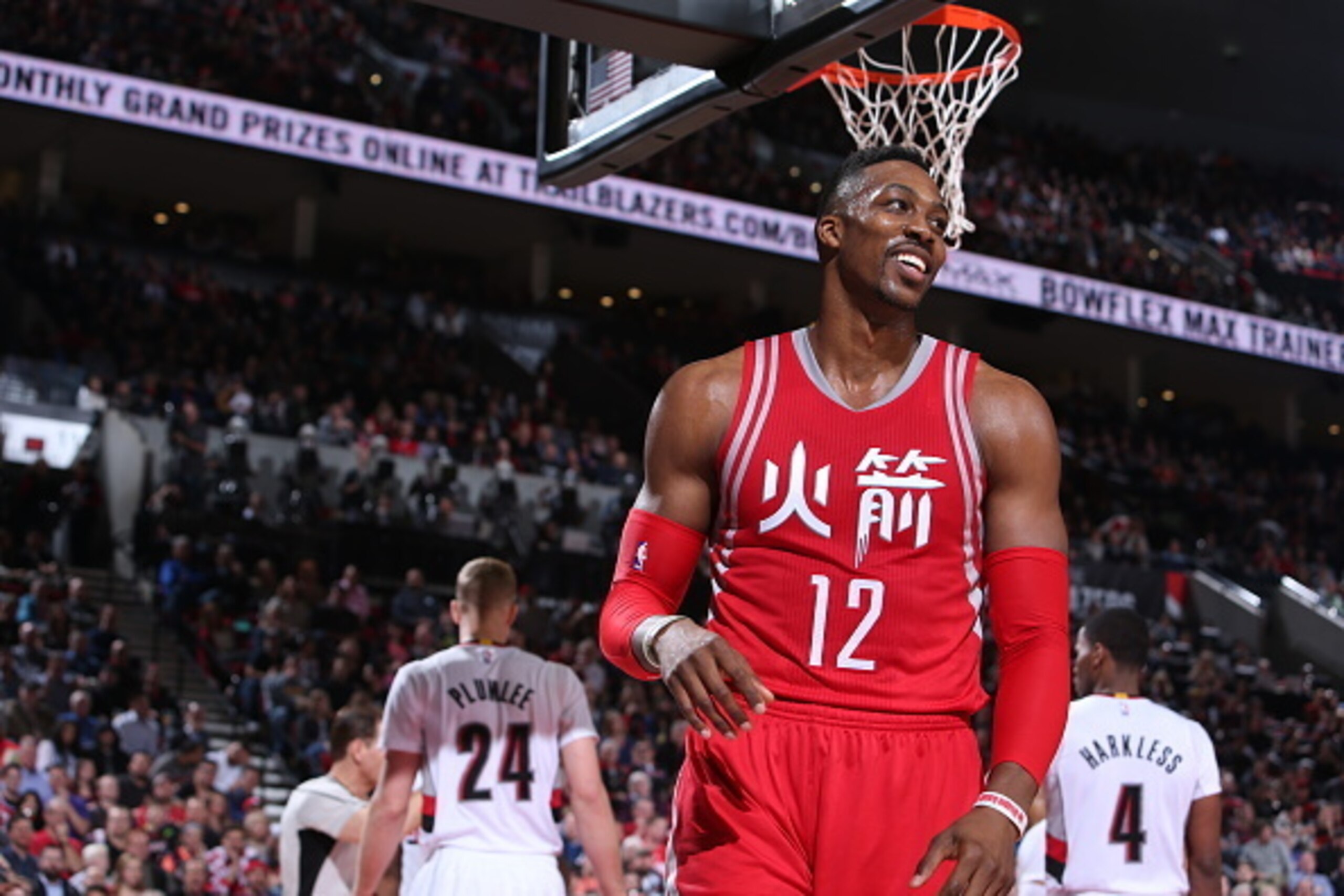 PORTLAND, OR - FEBRUARY 10: Dwight Howard #12 of the Houston Rockets looks on during the game against the Portland Trail Blazers on February 10, 2016 at the Moda Center in Portland, Oregon. NOTE TO USER: User expressly acknowledges and agrees that, by do PORTLAND, OR - FEBRUARY 10: Dwight Howard #12 of the Houston Rockets looks on during the game against the Portland Trail Blazers on February 10, 2016 at the Moda Center in Portland, Oregon. NOTE TO USER: User expressly acknowledges and agrees that, by do