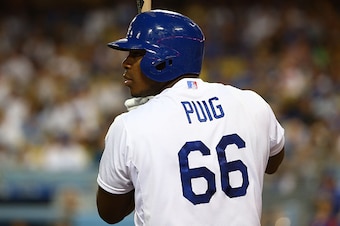 LOS ANGELES, CA - OCTOBER 03:  Yasiel Puig #66 of the Los Angeles Dodgers stands on deck in the fourth inning during the MLB game against the San Diego Padres at Dodger Stadium on October 3, 2015 in Los Angeles, California. The Dodgers defeated the Padres
