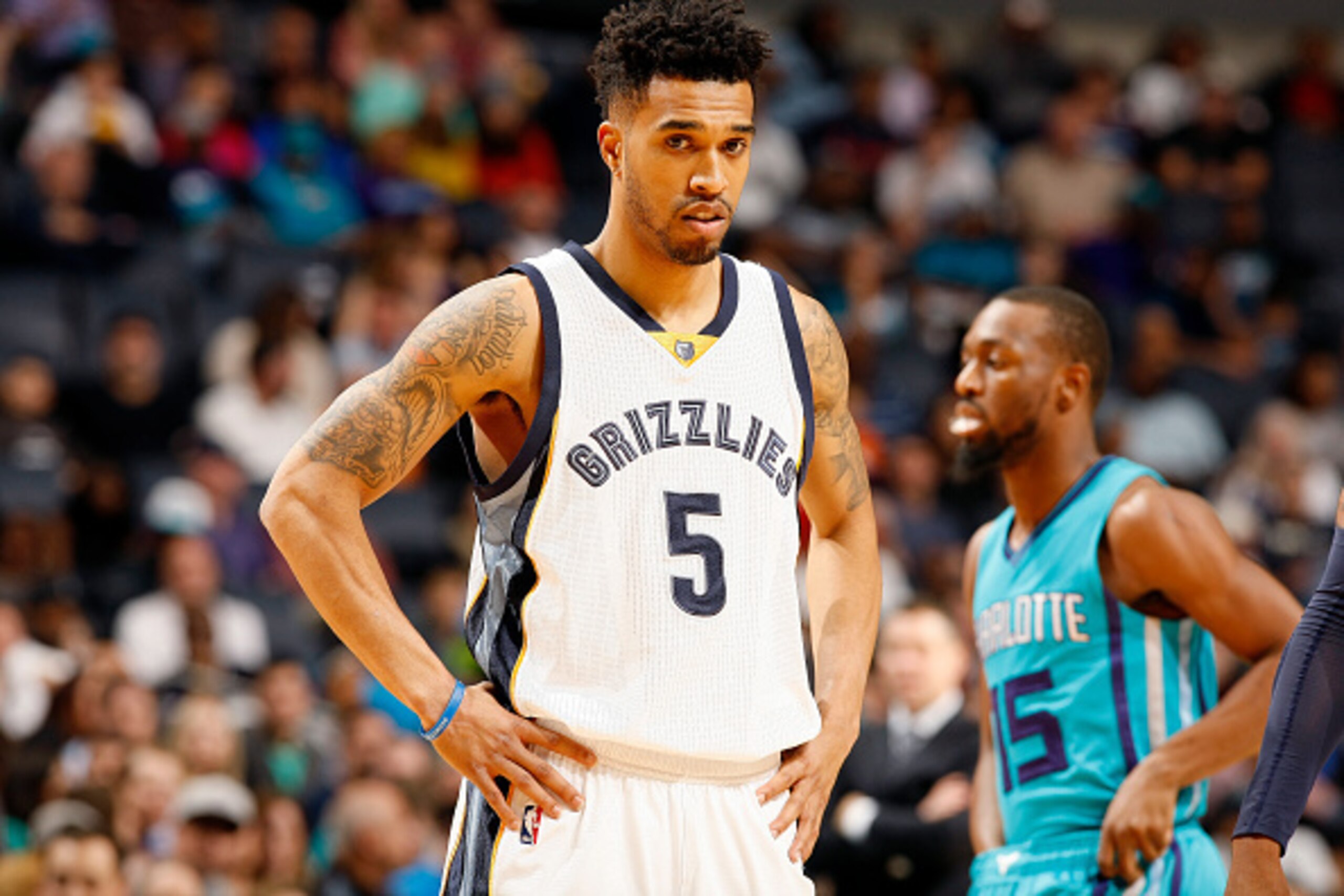 CHARLOTTE, NC - DECEMBER 26: Courtney Lee #5 of the Memphis Grizzlies looks on during the game against the Charlotte Hornets on December 26, 2015 at Time Warner Cable Arena in Charlotte, North Carolina. NOTE TO USER: User expressly acknowledges and agrees CHARLOTTE, NC - DECEMBER 26: Courtney Lee #5 of the Memphis Grizzlies looks on during the game against the Charlotte Hornets on December 26, 2015 at Time Warner Cable Arena in Charlotte, North Carolina. NOTE TO USER: User expressly acknowledges and agrees