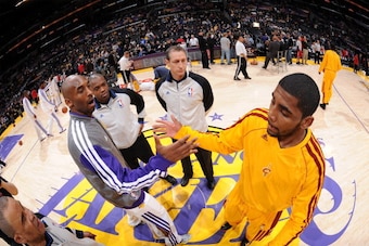 LOS ANGELES, CA - JANUARY 13: Kobe Bryant #24 of the Los Angeles Lakers and Kyrie Irving #2 of the Cleveland Cavaliers greet each other before their game at Staples Center on January 13, 2013 in Los Angeles, California. NOTE TO USER: User expressly acknow
