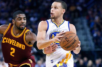 OAKLAND, CA - JANUARY 09:  Stephen Curry #30 of the Golden State Warriors drives past Kyrie Irving #2 of the Cleveland Cavaliers at ORACLE Arena on January 9, 2015 in Oakland, California.  (Photo by Thearon W. Henderson/Getty Images)