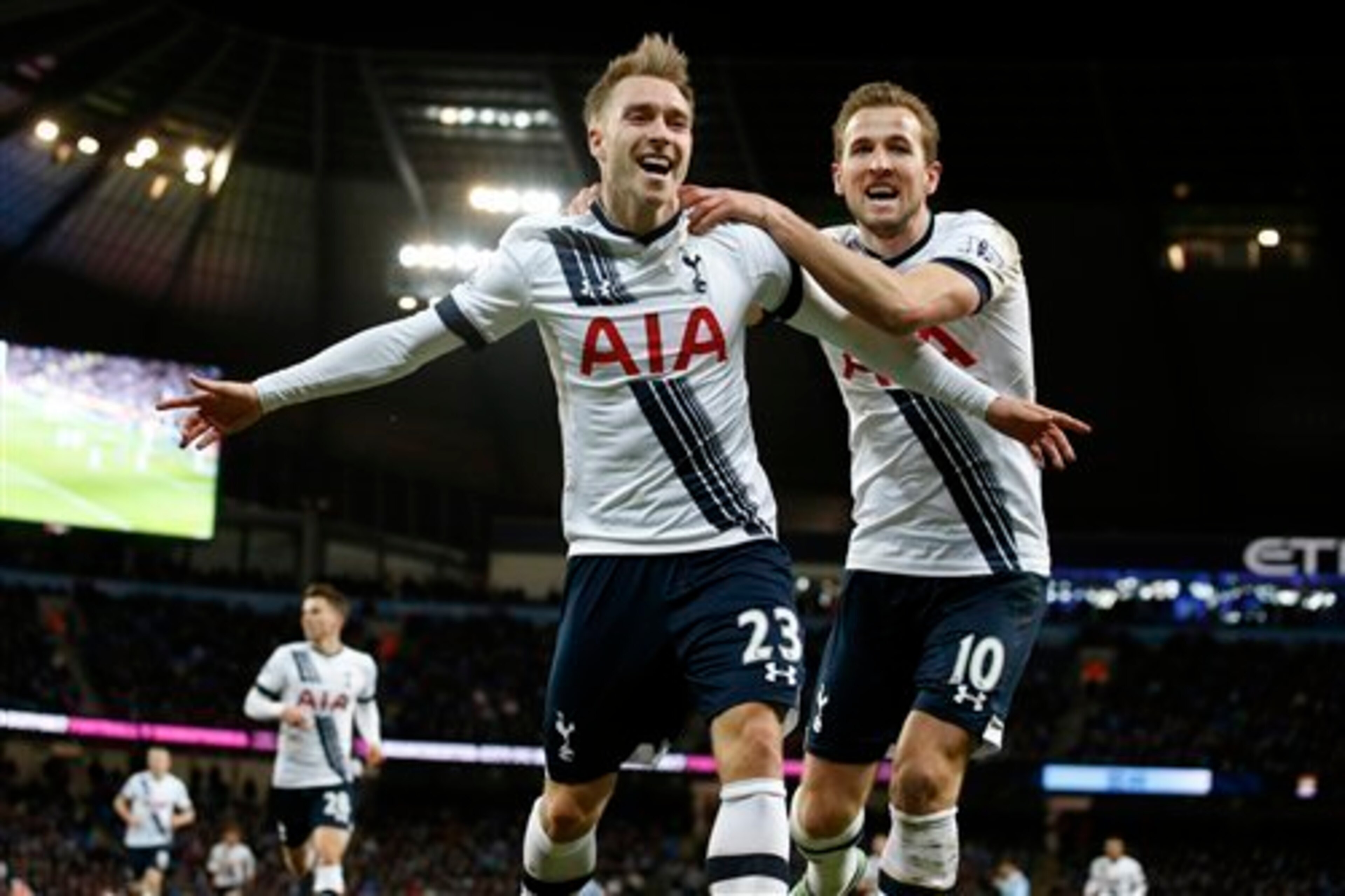 Eriksen and Kane celebrate as Spurs beat City.