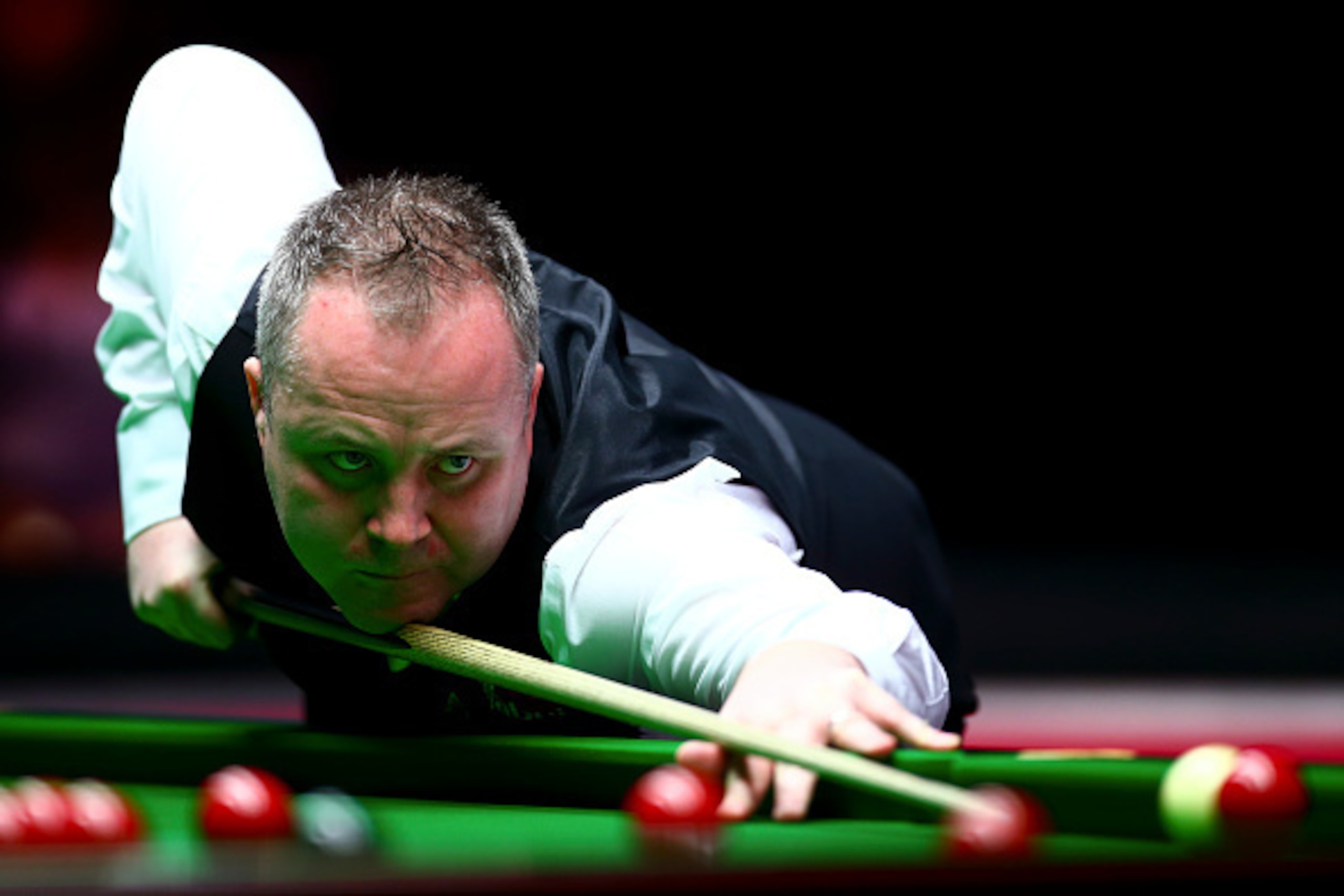 LONDON, ENGLAND - JANUARY 13:  John Higgins of Scotland plays a shot in his first round match against Liang Wenbo of China during Day Four of the Dafabet Masters at Alexandra Palace on January 13, 2016 in London, England.  (Photo by Jordan Mansfield/Getty