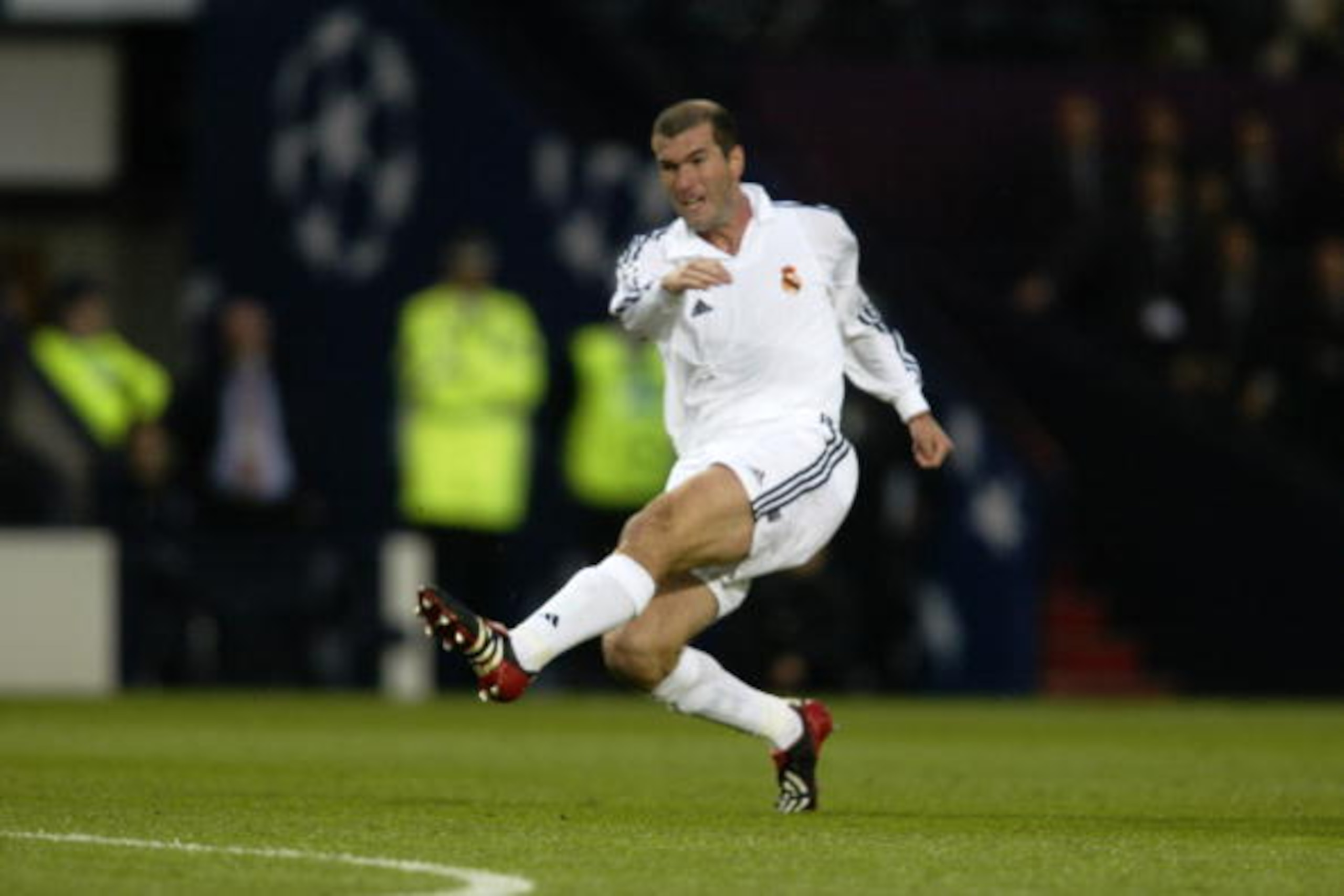 GLASGOW - May 15: Zinedine Zidane of Real Madrid has a shot at goal during the UEFA Champions League Final between Real Madrid and Bayer Leverkusen played at Hampden Park, in Glasgow, Scotland on May 15, 2002. Real Madrid won the match and cup 2-1. DIGIT GLASGOW - May 15: Zinedine Zidane of Real Madrid has a shot at goal during the UEFA Champions League Final between Real Madrid and Bayer Leverkusen played at Hampden Park, in Glasgow, Scotland on May 15, 2002. Real Madrid won the match and cup 2-1. DIGIT