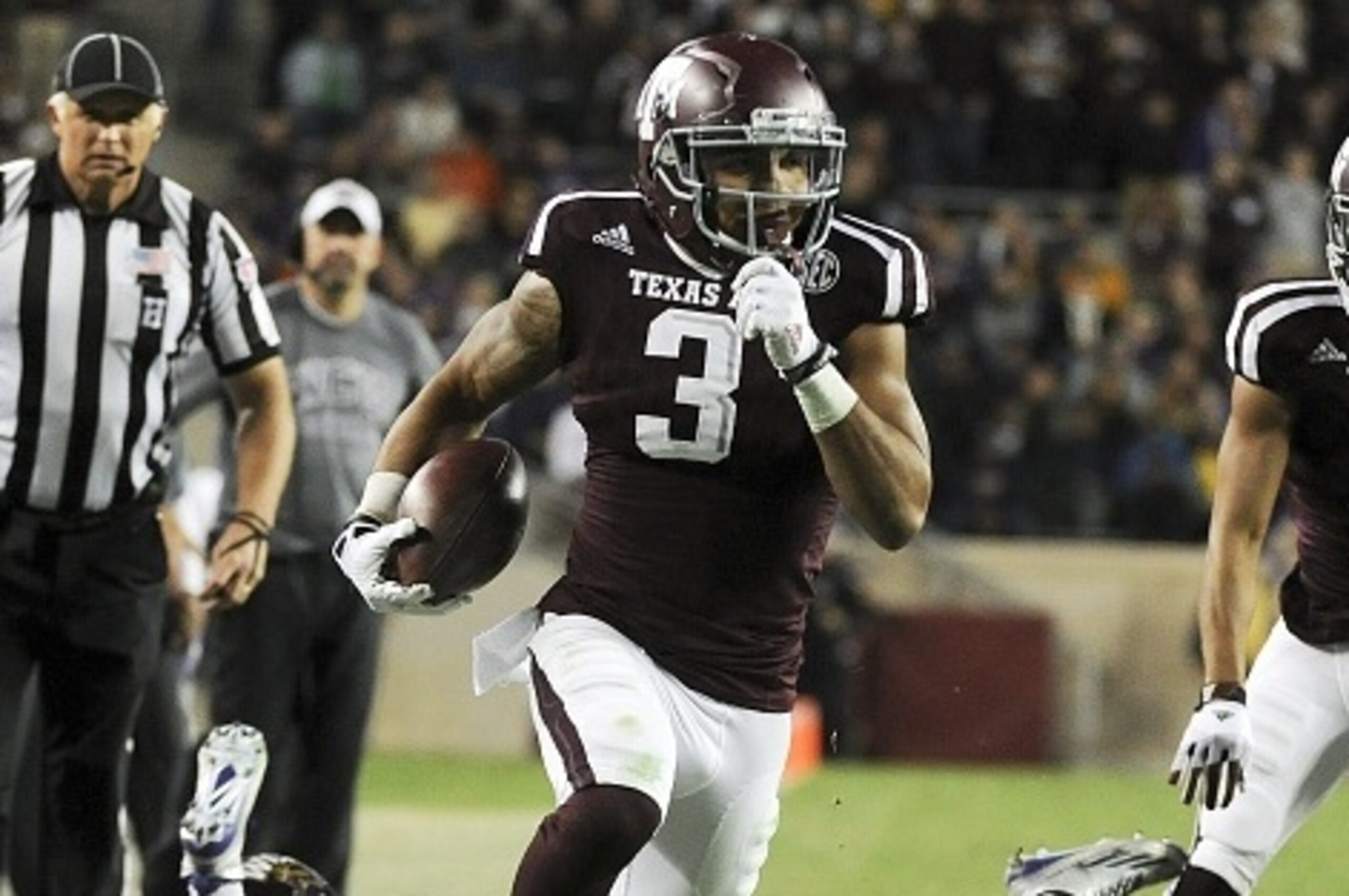 COLLEGE STATION, TX - NOVEMBER 14: Christian Kirk #3 of the Texas A&M Aggies runs for a 22-yard touchdown reception in the fourth quarter of a NCAA football game against the Western Carolina Catamounts at Kyle Field on November 14, 2015 in College Station COLLEGE STATION, TX - NOVEMBER 14: Christian Kirk #3 of the Texas A&M Aggies runs for a 22-yard touchdown reception in the fourth quarter of a NCAA football game against the Western Carolina Catamounts at Kyle Field on November 14, 2015 in College Station