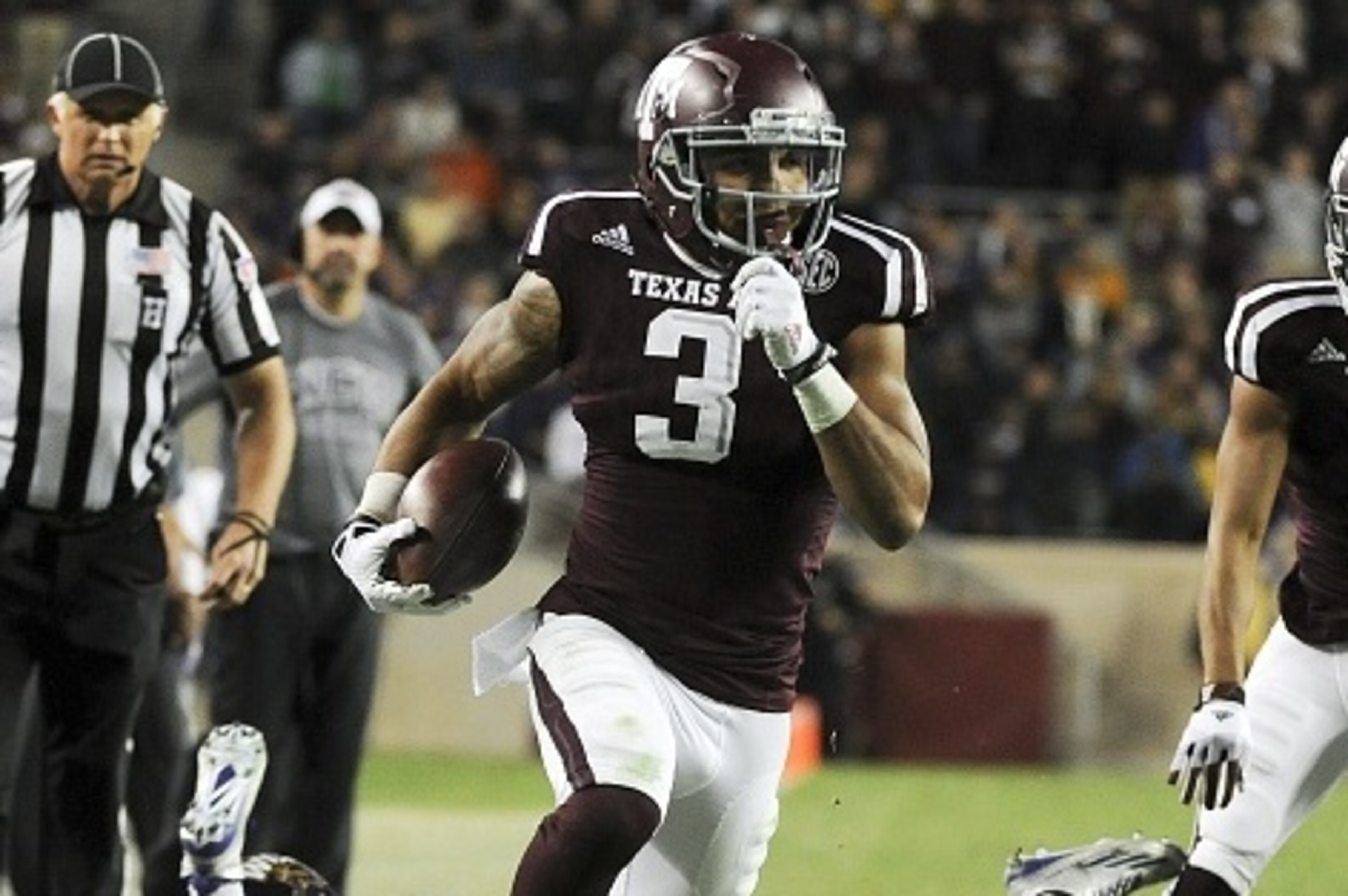 COLLEGE STATION, TX - NOVEMBER 14: Christian Kirk #3 of the Texas A&M Aggies runs for a 22-yard touchdown reception in the fourth quarter of a NCAA football game against the Western Carolina Catamounts at Kyle Field on November 14, 2015 in College Station