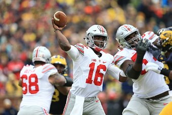 ANN ARBOR, MI - NOVEMBER 28: Quarterback J.T. Barrett #16 of the Ohio State Buckeyes drops back to pass during the game against the Michigan Wolverines at Michigan Stadium on November 28, 2015 in Ann Arbor, Michigan. Ohio State defeated Michigan 42-13. (P