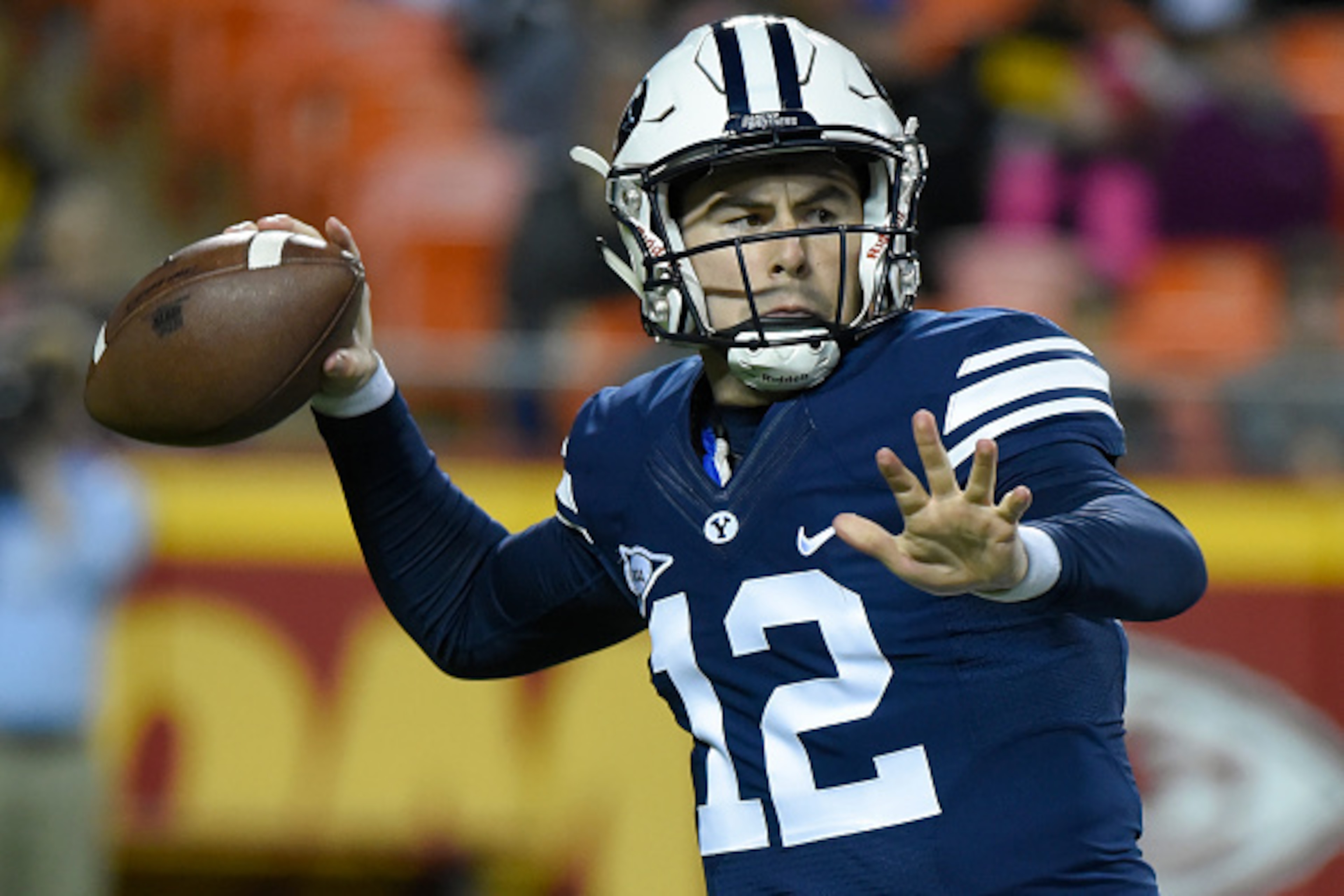 KANSAS CITY, MO - NOVEMBER 14: Quarterback Tanner Mangum #12 of the Brigham Young Cougars passes against the Missouri Tigers in the first quarter at Arrowhead Stadium on November 14, 2015 in Kansas City, Missouri. (Photo by Ed Zurga/Getty Images) KANSAS CITY, MO - NOVEMBER 14: Quarterback Tanner Mangum #12 of the Brigham Young Cougars passes against the Missouri Tigers in the first quarter at Arrowhead Stadium on November 14, 2015 in Kansas City, Missouri. (Photo by Ed Zurga/Getty Images)