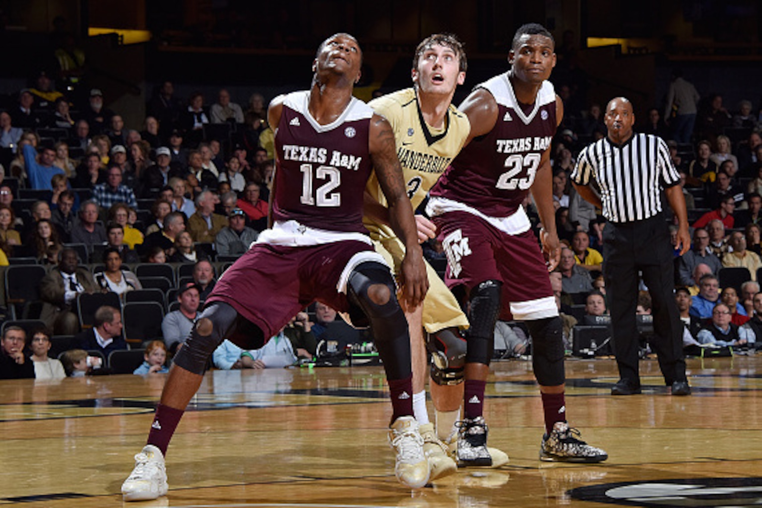 NASHVILLE, TENNESSEE - FEBRUARY 04: Jalen Jones #12 and Danuel House #23 of the Texas A&M Aggies play against Luke Kornet #3 of the Vanderbilt Commodores at Memorial Gym on February 4, 2016 in Nashville, Tennessee. (Photo by Frederick Breedon/Getty Imag NASHVILLE, TENNESSEE - FEBRUARY 04: Jalen Jones #12 and Danuel House #23 of the Texas A&M Aggies play against Luke Kornet #3 of the Vanderbilt Commodores at Memorial Gym on February 4, 2016 in Nashville, Tennessee. (Photo by Frederick Breedon/Getty Imag