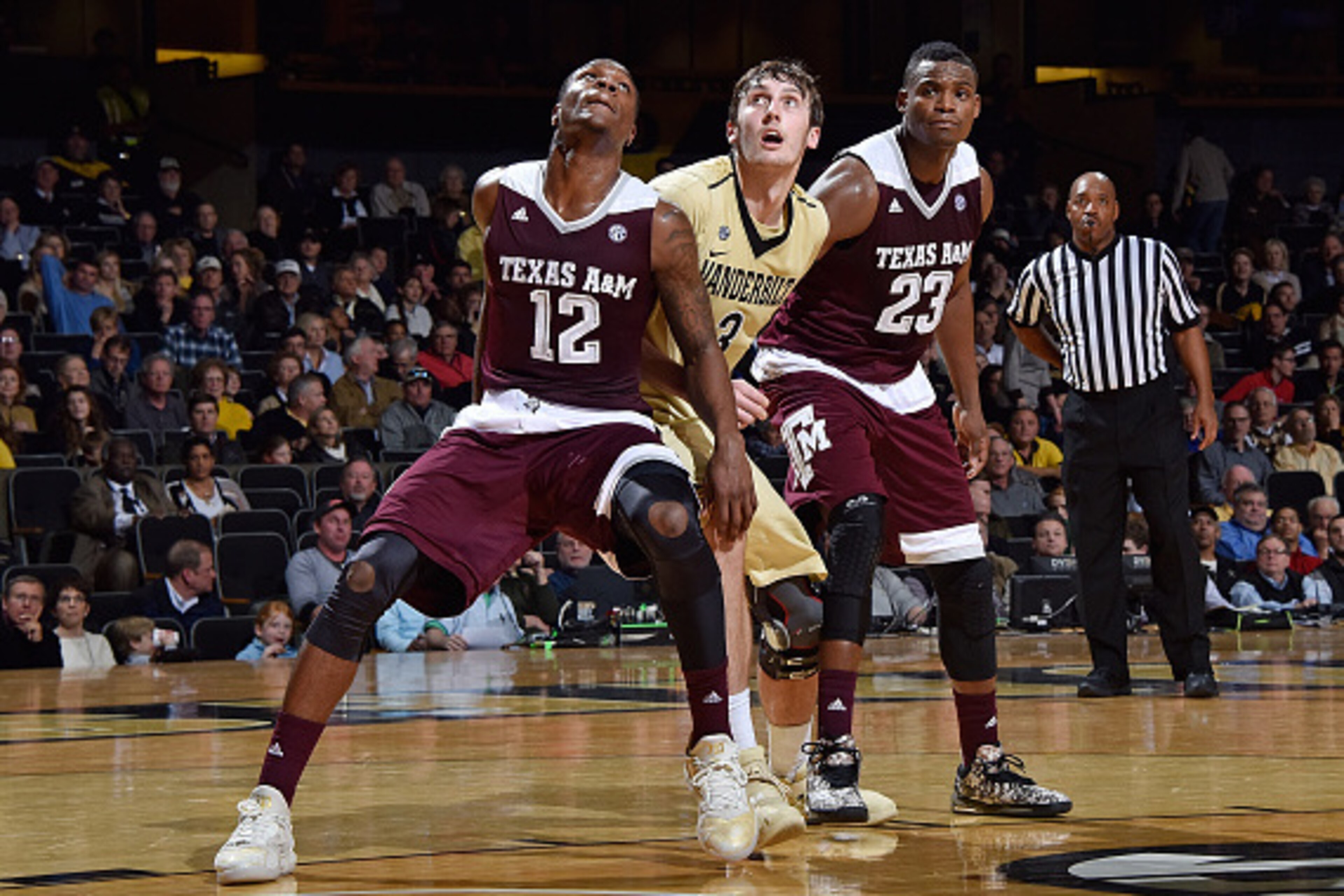 NASHVILLE, TENNESSEE - FEBRUARY 04: Jalen Jones #12 and Danuel House #23 of the Texas A&M Aggies play against Luke Kornet #3 of the Vanderbilt Commodores at Memorial Gym on February 4, 2016 in Nashville, Tennessee. (Photo by Frederick Breedon/Getty Imag NASHVILLE, TENNESSEE - FEBRUARY 04: Jalen Jones #12 and Danuel House #23 of the Texas A&M Aggies play against Luke Kornet #3 of the Vanderbilt Commodores at Memorial Gym on February 4, 2016 in Nashville, Tennessee. (Photo by Frederick Breedon/Getty Imag