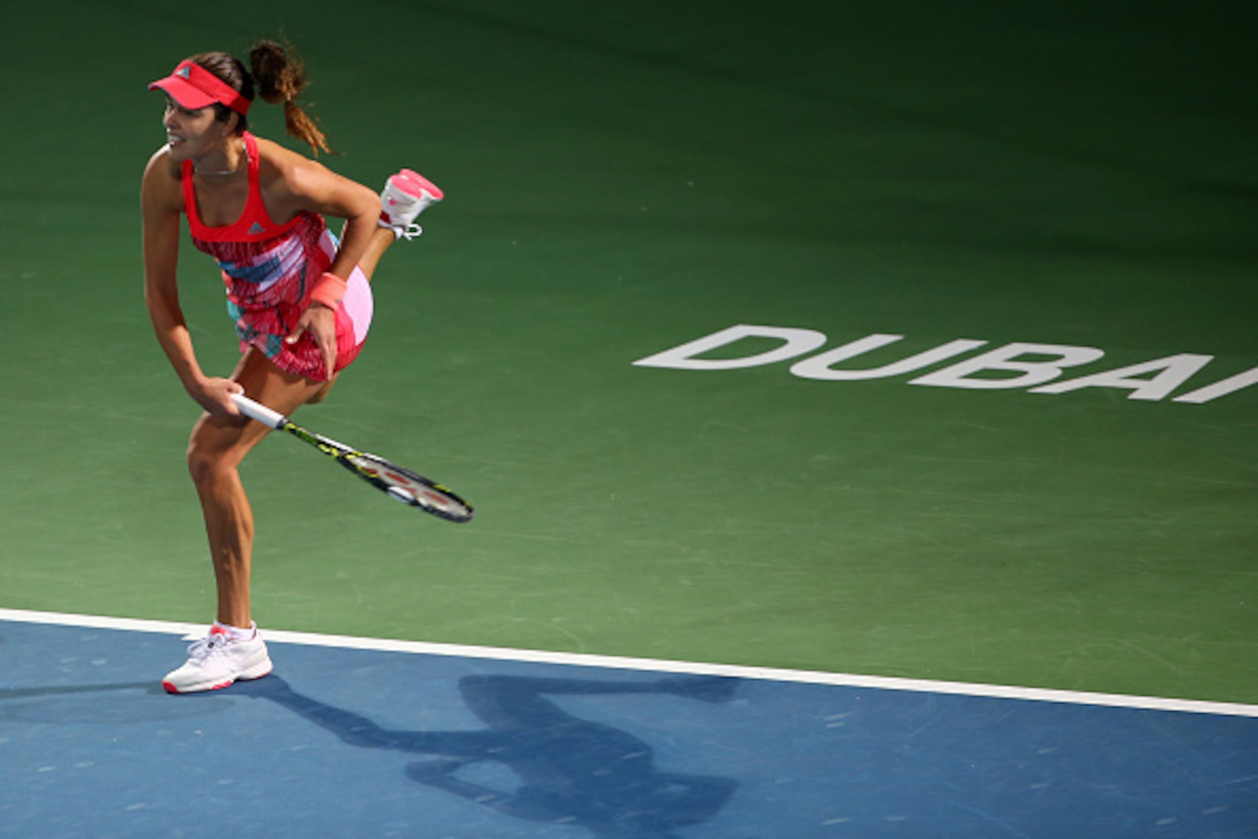 Serbia's Ana Ivanovic serves the ball to Simona Halep of Roumania during their WTA game on the third day of the Dubai Duty Free Tennis Championships, on February 17, 2016. / AFP / MARWAN NAAMANI        (Photo credit should read MARWAN NAAMANI/AFP/Getty Im