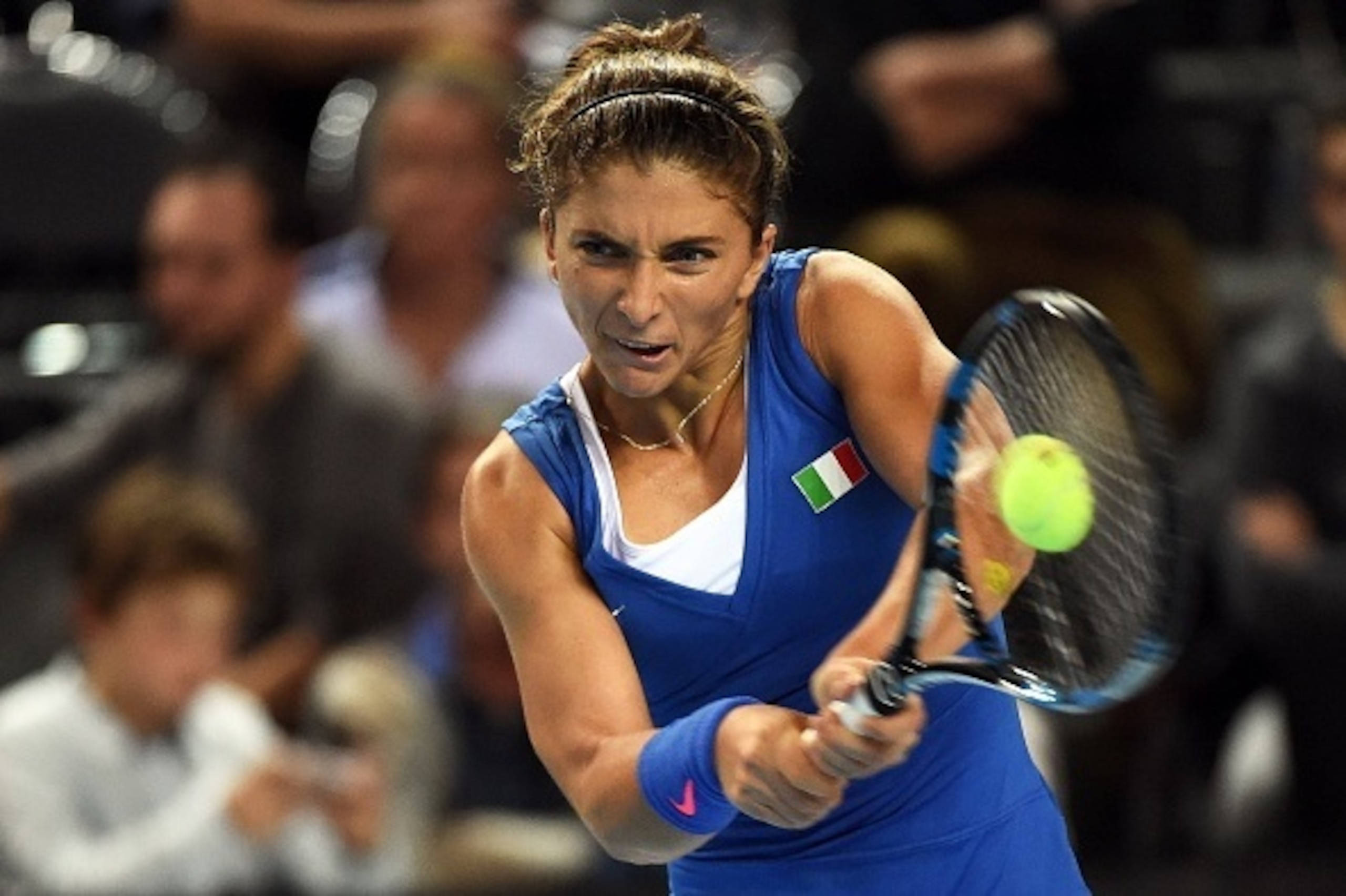 Italian Fed Cup player Sara Errani returns to France's Fed Cup player Caroline Garcia  during the first round of thr Fed Cup World Group on February 6, 2016 in Marseille, southern France.  / AFP / ANNE-CHRISTINE POUJOULAT        (Photo credit should read 