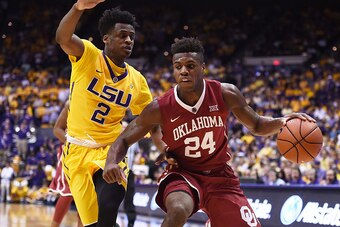 BATON ROUGE, LA - JANUARY 30:  Buddy Hield #24 of the Oklahoma Sooners works against Antonio Blakeney #2 of the LSU Tigers during a game at the Pete Maravich Assembly Center on January 30, 2016 in Baton Rouge, Louisiana. Oklahoma defeated LSU 77-75.  (Pho