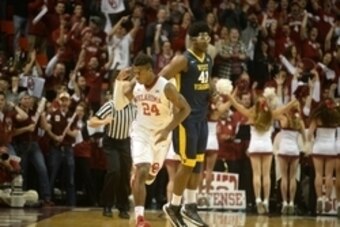 Jan 16, 2016; Norman, OK, USA; Oklahoma Sooners guard Buddy Hield (24) reacts after a made 3 point shot against the West Virginia Mountaineers during the first half at Lloyd Noble Center. Mandatory Credit: Mark D. Smith-USA TODAY Sports