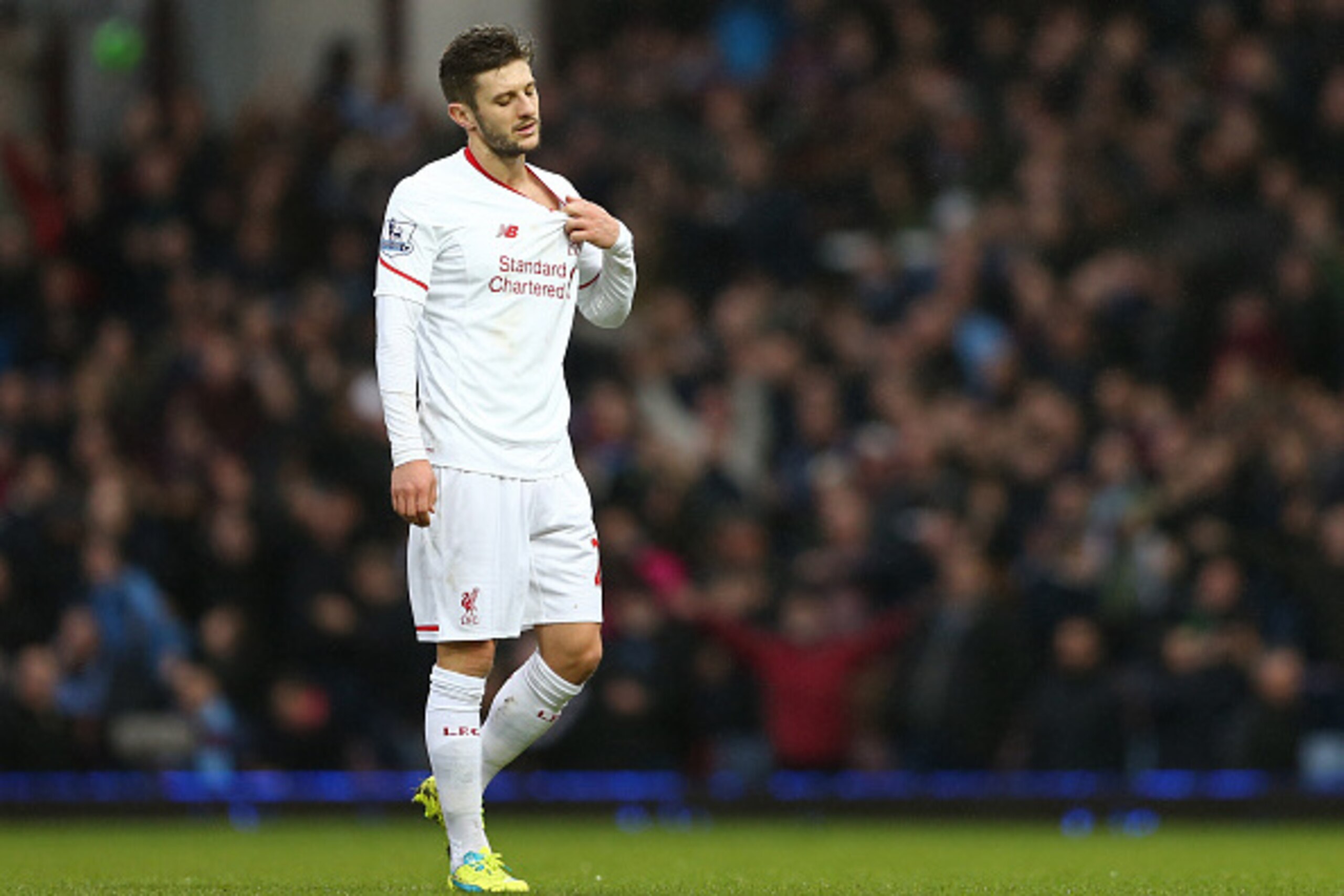 Liverpool's English midfielder Adam Lallana reacts as he leaves the pitch after the English Premier League football match between West Ham United and Liverpool at The Boleyn Ground in Upton Park, East London on January 2, 2016. West Ham won the game 2-0. Liverpool's English midfielder Adam Lallana reacts as he leaves the pitch after the English Premier League football match between West Ham United and Liverpool at The Boleyn Ground in Upton Park, East London on January 2, 2016. West Ham won the game 2-0.