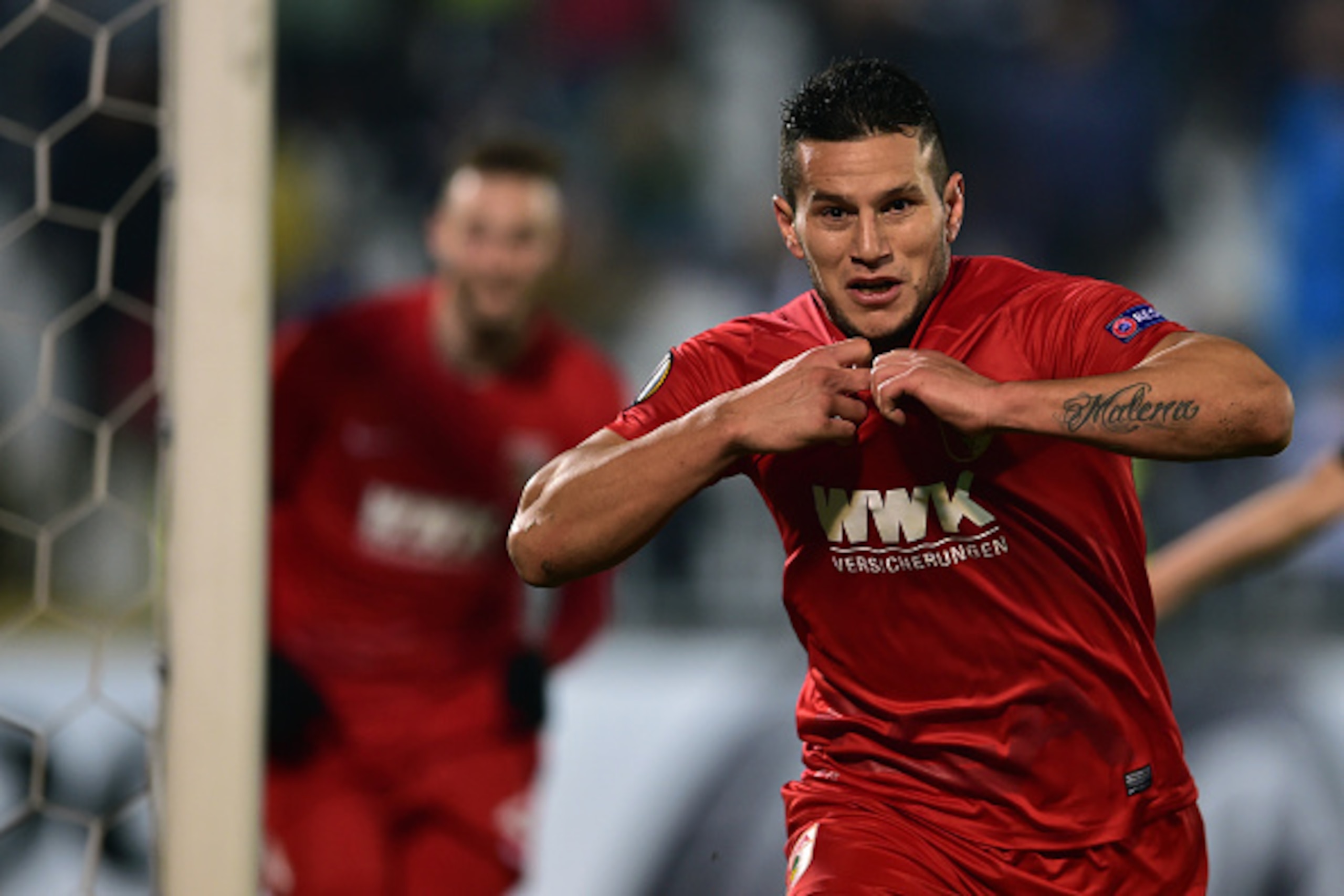 Augsburg's Raul Bobadilla celebrates after scoring during the UEFA Europa League football match between FK Partizan and FC Augsburg at FK Partizan stadium in Belgrade on Decembar 10, 2015. / AFP / ANDREJ ISAKOVIC (Photo credit should read ANDREJ IS Augsburg's Raul Bobadilla celebrates after scoring during the UEFA Europa League football match between FK Partizan and FC Augsburg at FK Partizan stadium in Belgrade on Decembar 10, 2015. / AFP / ANDREJ ISAKOVIC (Photo credit should read ANDREJ IS