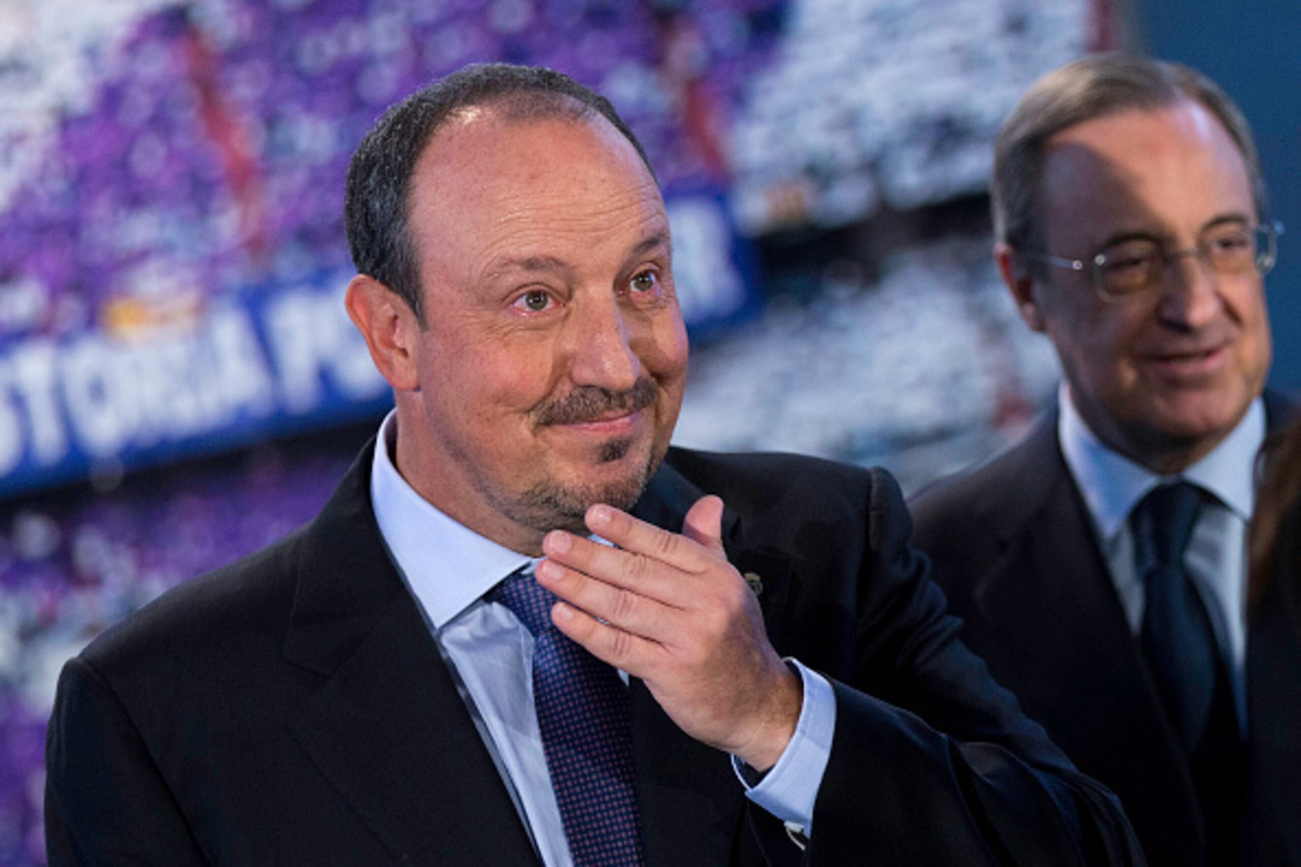 MADRID, SPAIN - JUNE 03:  New Real Madrid head coach Rafael Benitez (L) looks on with his eyes wet ahead president Florentino Perez  (R) after his presentation at Santiago Bernabeu stadium on June 3, 2015 in Madrid, Spain.  (Photo by Gonzalo Arroyo Moreno