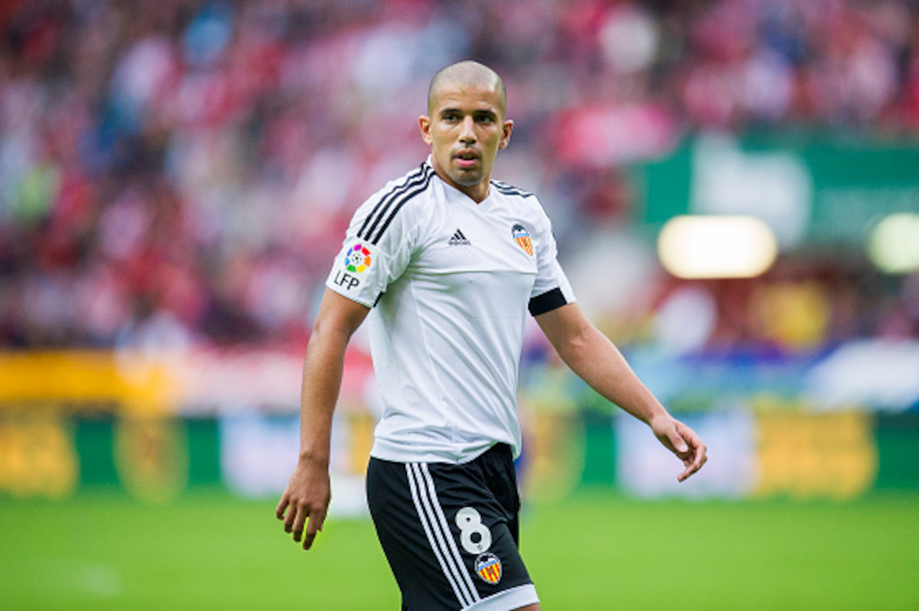 GIJON, SPAIN - SEPTEMBER 12: Sofiane Feghouli of Valencia CF reacts during the La Liga match between Sporting Gijon and Valencia CF at Estadio El Molinon on September 12, 2015 in Gijon, Spain. (Photo by Juan Manuel Serrano Arce/Getty Images) GIJON, SPAIN - SEPTEMBER 12: Sofiane Feghouli of Valencia CF reacts during the La Liga match between Sporting Gijon and Valencia CF at Estadio El Molinon on September 12, 2015 in Gijon, Spain. (Photo by Juan Manuel Serrano Arce/Getty Images)