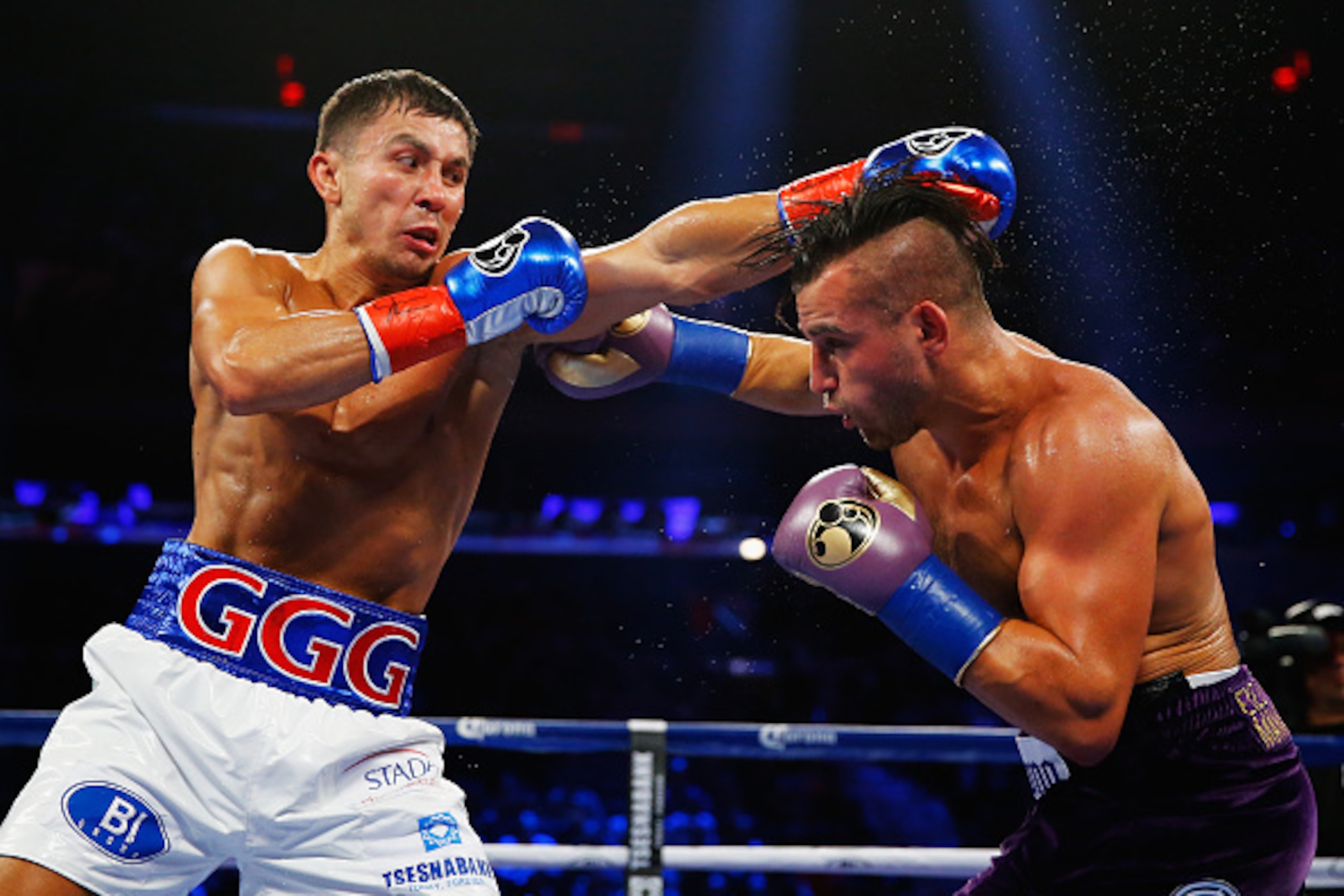 NEW YORK, NY - OCTOBER 17:  Gennady Golovkin exchanges punches with David Lemieux during their WBA/WBC interim/IBF middleweight title unification bout at Madison Square Garden on October 17, 2015 in New York City.  (Photo by Al Bello/Getty Images)