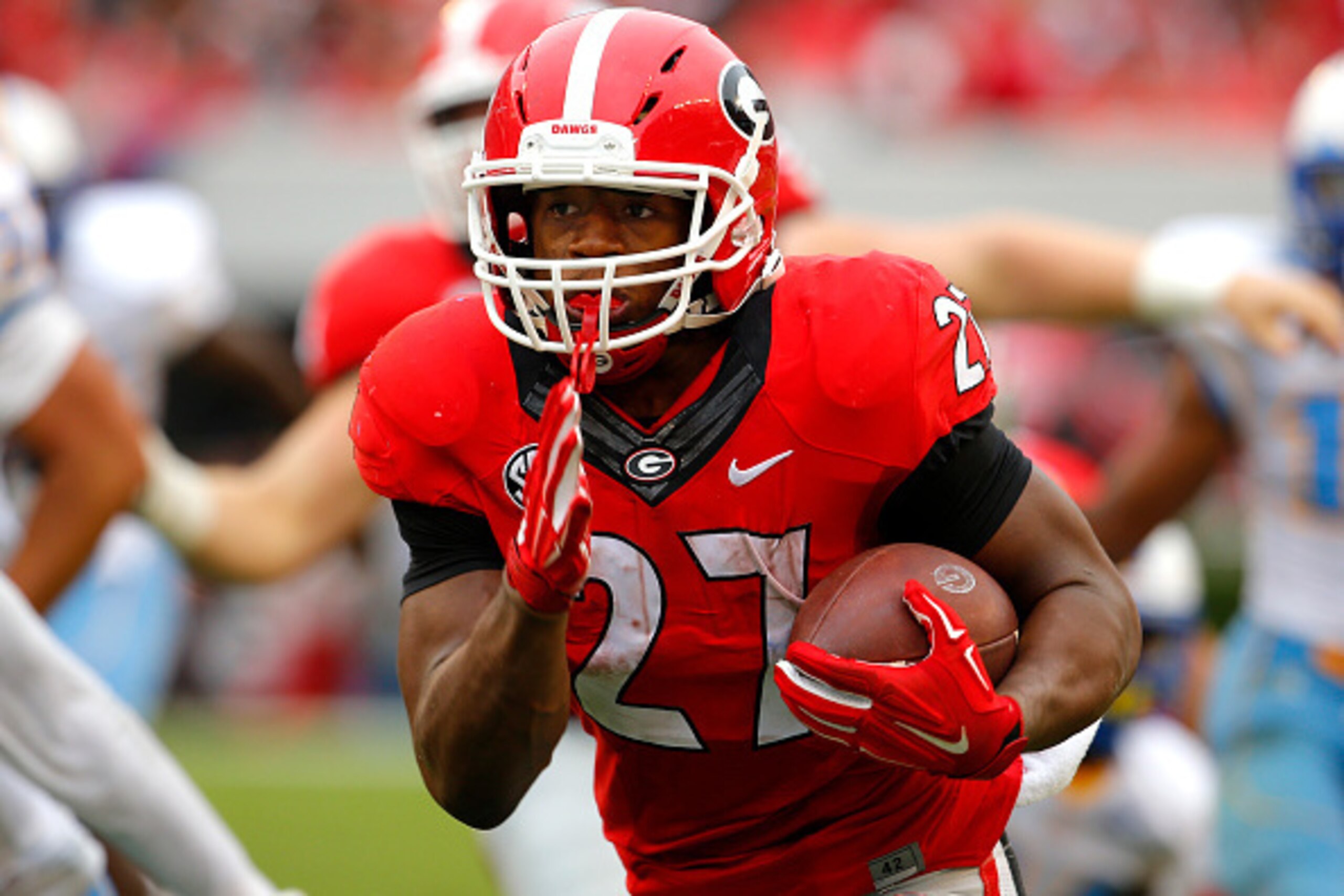 ATHENS, GA - SEPTEMBER 26: Running back Nick Chubb #27 of the Georgia Bulldogs rushes in for a touchdown in the third quarter of the game against the Southern University Jaguars on September 26, 2015 at Sanford Stadium in Athens, Georgia. The Georgia Bull ATHENS, GA - SEPTEMBER 26: Running back Nick Chubb #27 of the Georgia Bulldogs rushes in for a touchdown in the third quarter of the game against the Southern University Jaguars on September 26, 2015 at Sanford Stadium in Athens, Georgia. The Georgia Bull