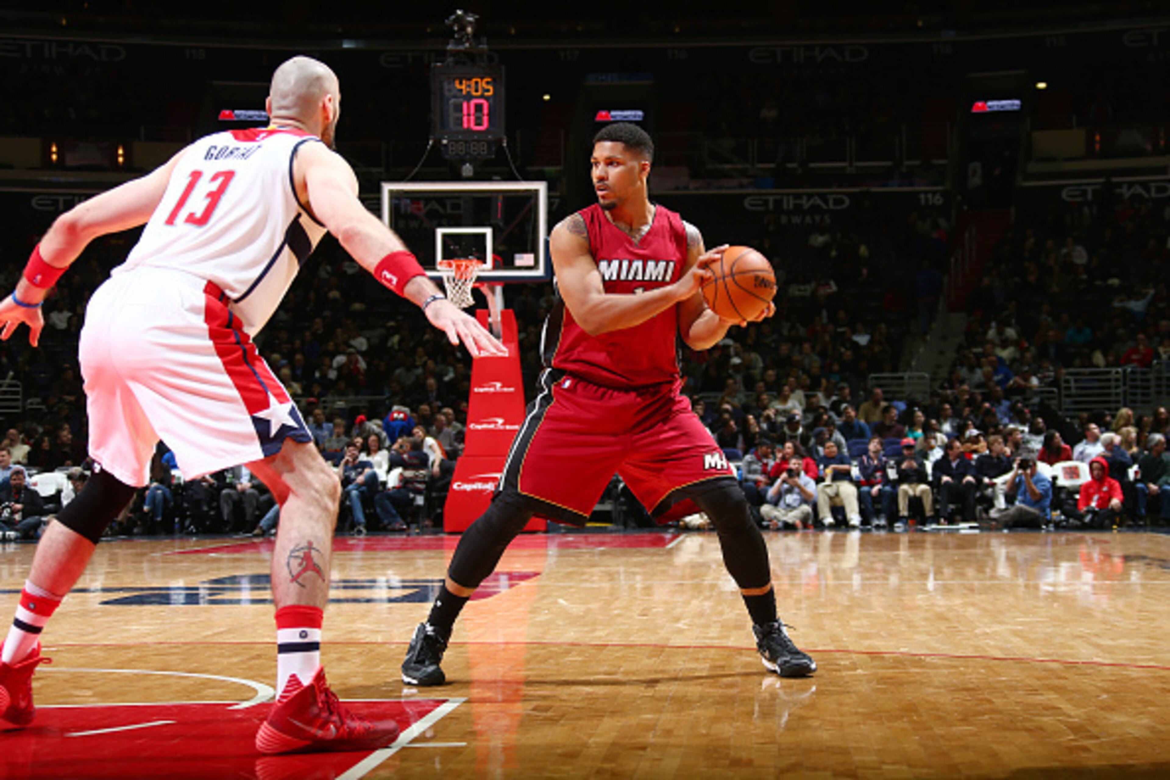 WASHINGTON, DC -  JANUARY 20: Jarnell Stokes #12 of the Miami Heat handles the ball during the game against the Washington Wizards on January 20, 2016 at Verizon Center in Washington, DC. NOTE TO USER: User expressly acknowledges and agrees that, by downl
