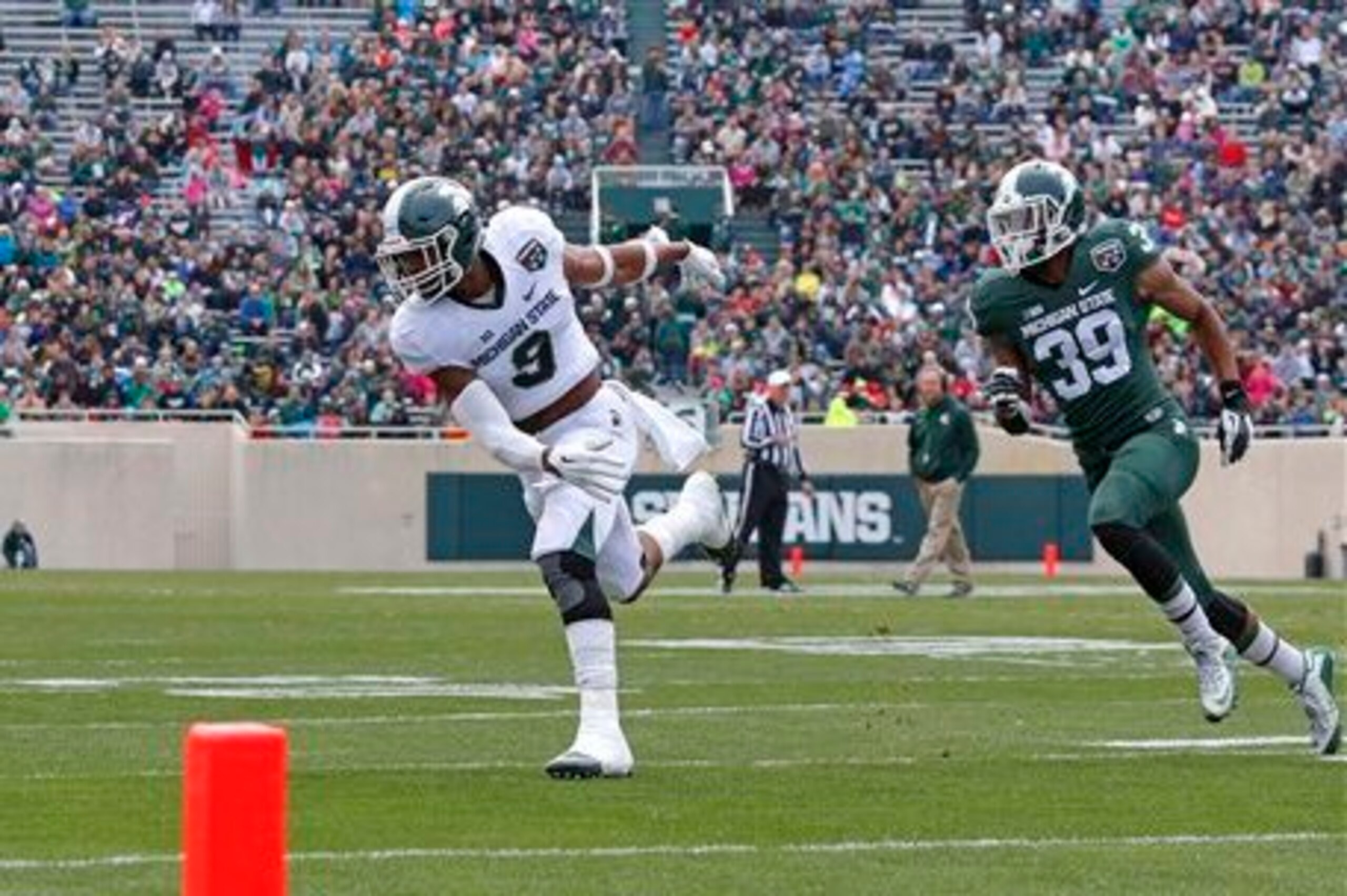 Michigan State DB Montae Nicholson (left)