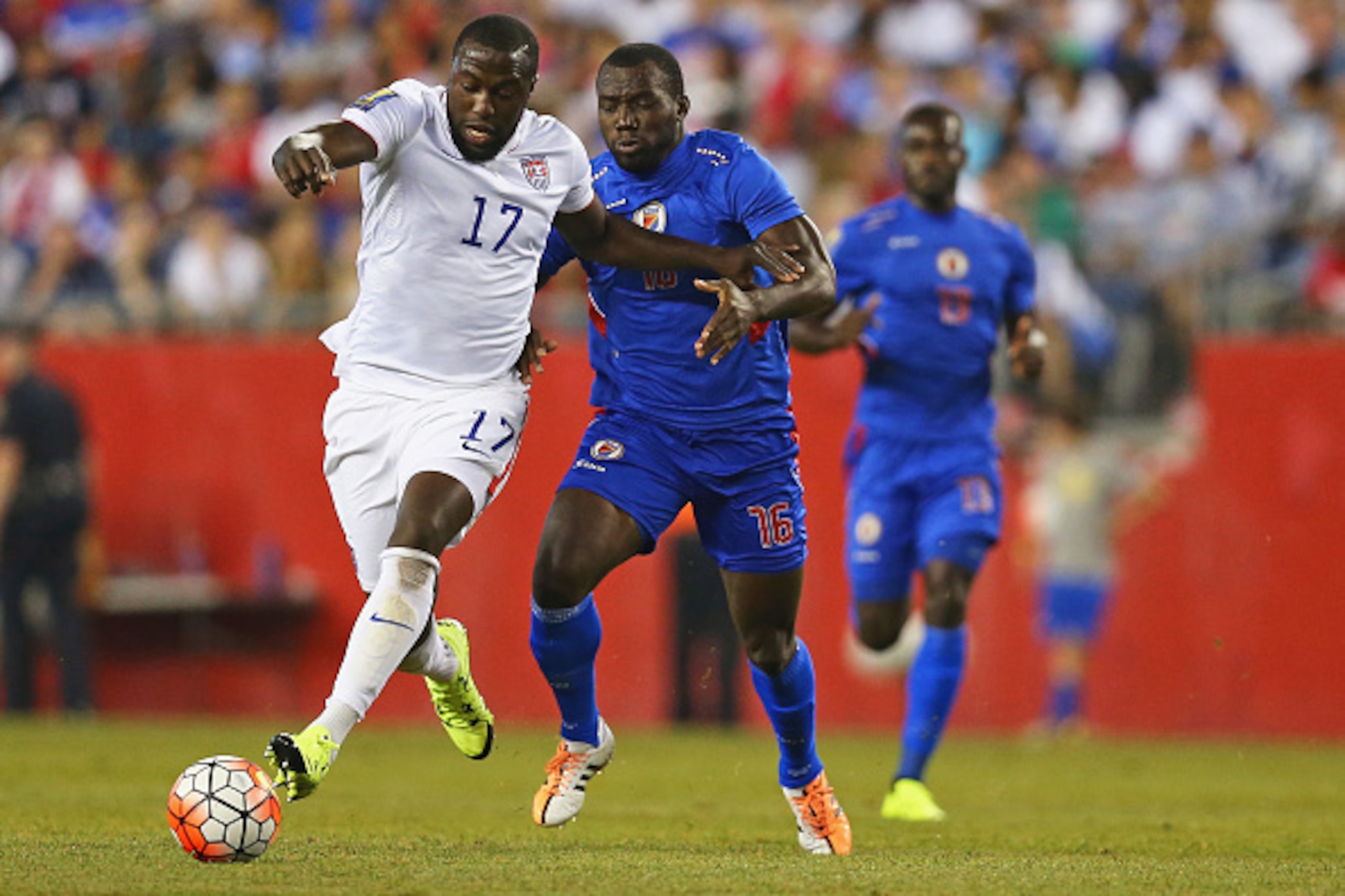 FOXBORO, MA - JULY 10:  Judelin Aveska #16 of Haiti defends Jozy Altidore #17 of United States during the 2015 CONCACAF  Gold Cup match between United States and Haiti at Gillette Stadium on July 10, 2015 in Foxboro, Massachusetts.  (Photo by Maddie Meyer