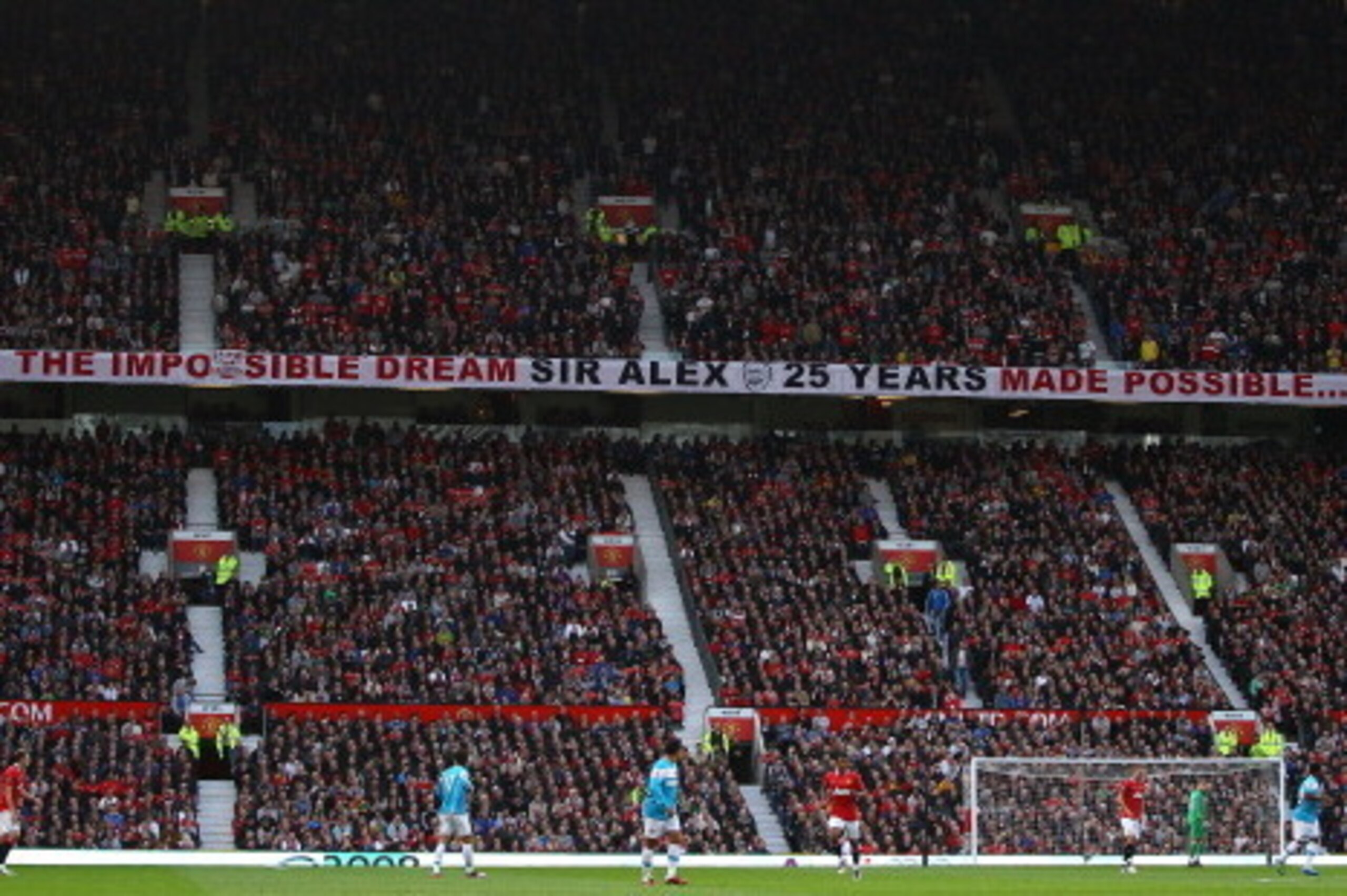 MANCHESTER, ENGLAND - NOVEMBER 05:  A banner in the Stretford End commemerating Sir Alex's 25th year as manager during the Barclays Premier League match between Manchester United and Sunderland at Old Trafford on November 5, 2011 in Manchester, England.  