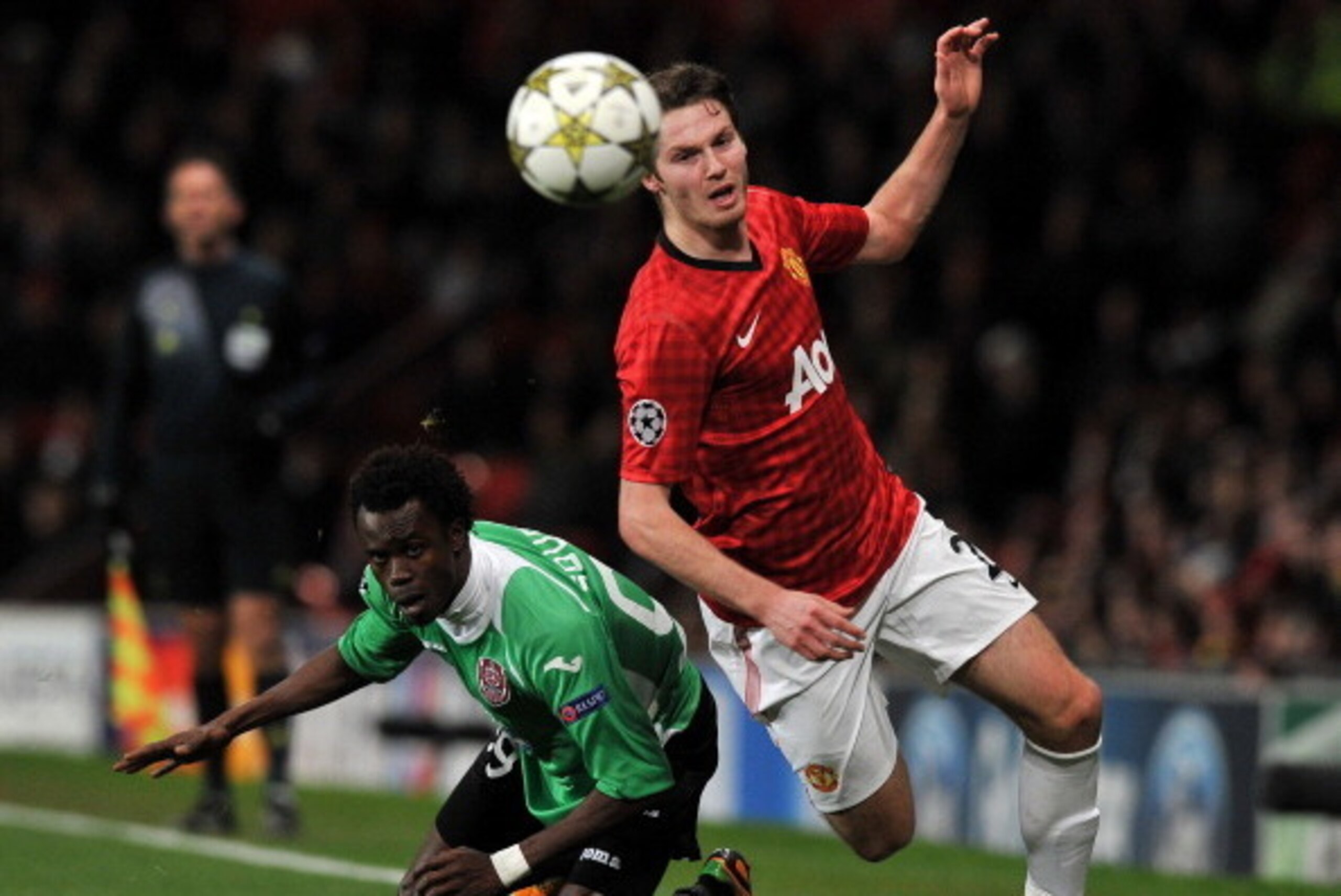 Manchester United's English midfielder Nick Powell (R) vies with Cluj's Senegalese forward Modou Sougou during the UEFA Champions League group H football match between Manchester United and CFR Cluj-Napoca at Old Trafford in Manchester, north-west England