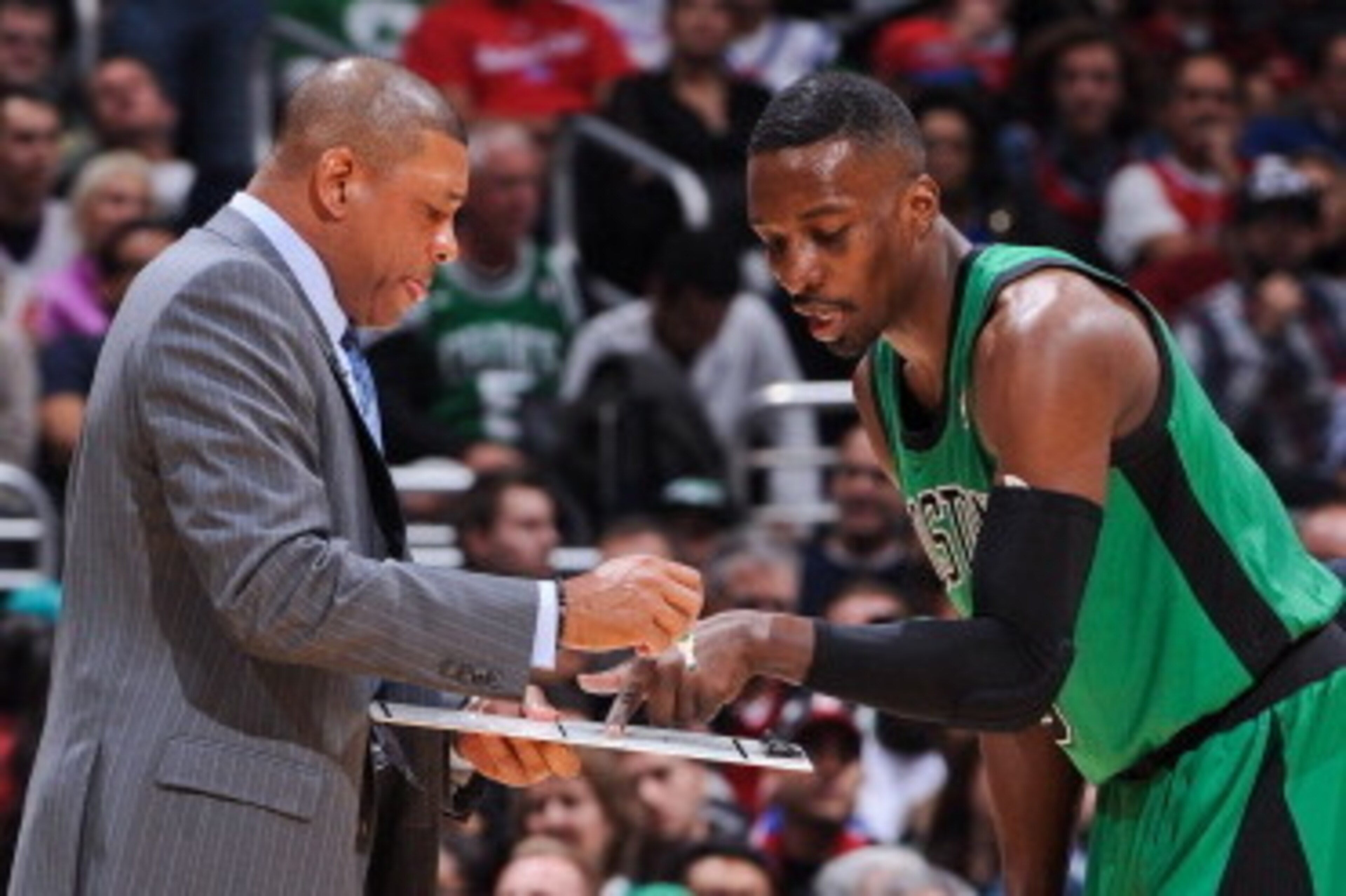 LOS ANGELES, CA - DECEMBER 27: Head Coach Doc Rivers of the Boston Celtics draws up a play with Jeff Green #8 against the Los Angeles Clippers on December 27, 2012 at the Staples Center in Los Angeles, California. NOTE TO USER: User expressly acknowledges