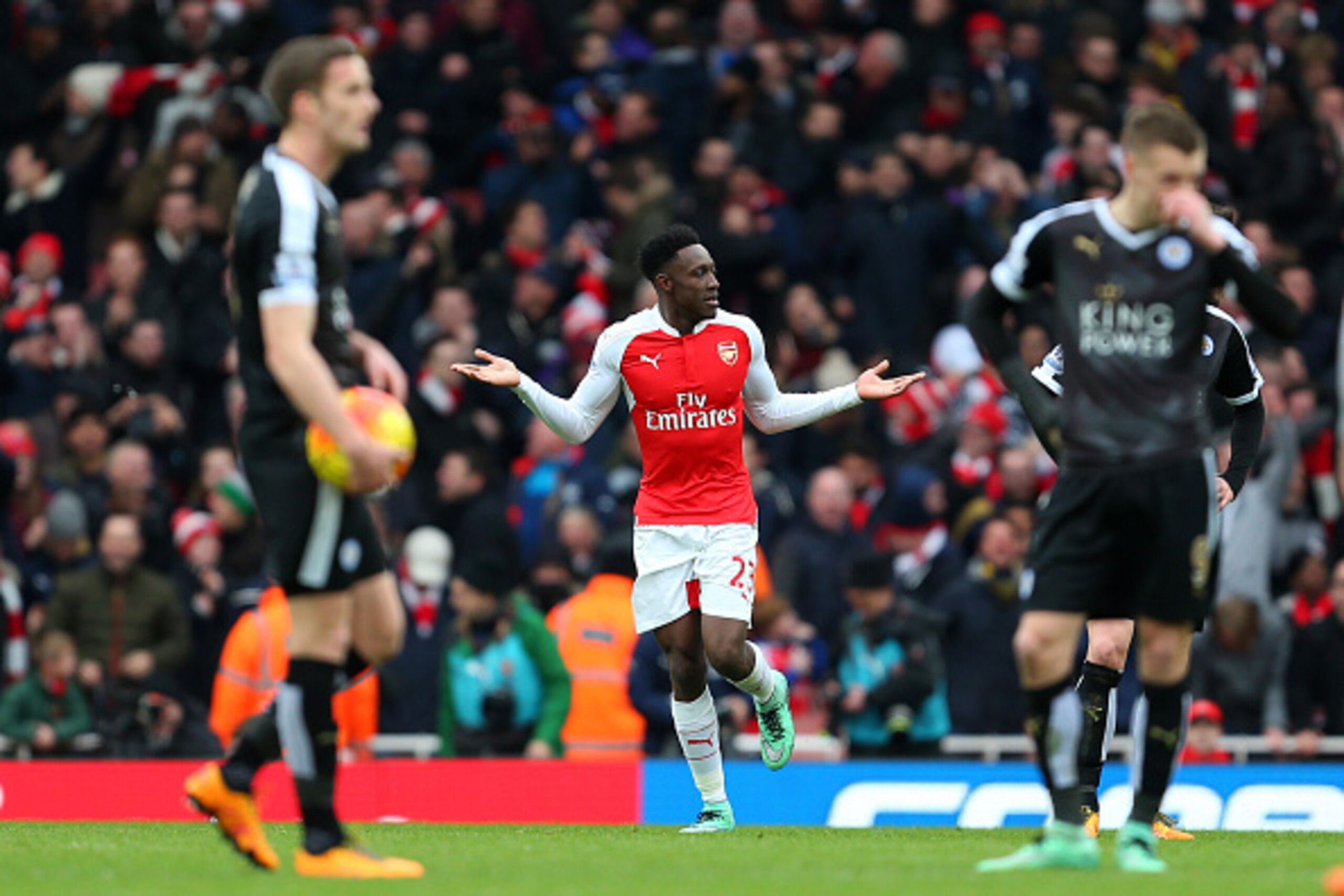 LONDON, ENGLAND - FEBRUARY 14 :  Danny Welbeck of Arsenal celebrates after he scores to make it 2-1 behind a dejected Leicester City team during the Barclays Premier League match between Arsenal and Leicester City at the Emirates Stadium on February 14, 2