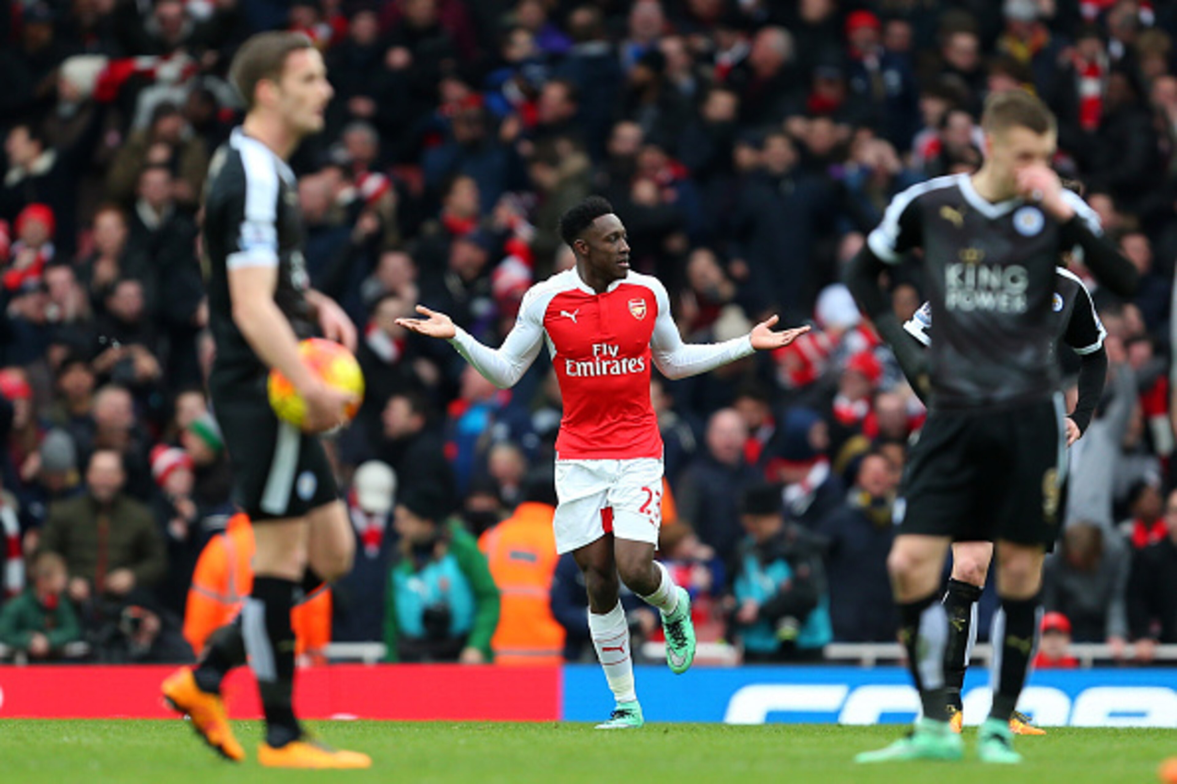 LONDON, ENGLAND - FEBRUARY 14 :  Danny Welbeck of Arsenal celebrates after he scores to make it 2-1 behind a dejected Leicester City team during the Barclays Premier League match between Arsenal and Leicester City at the Emirates Stadium on February 14, 2