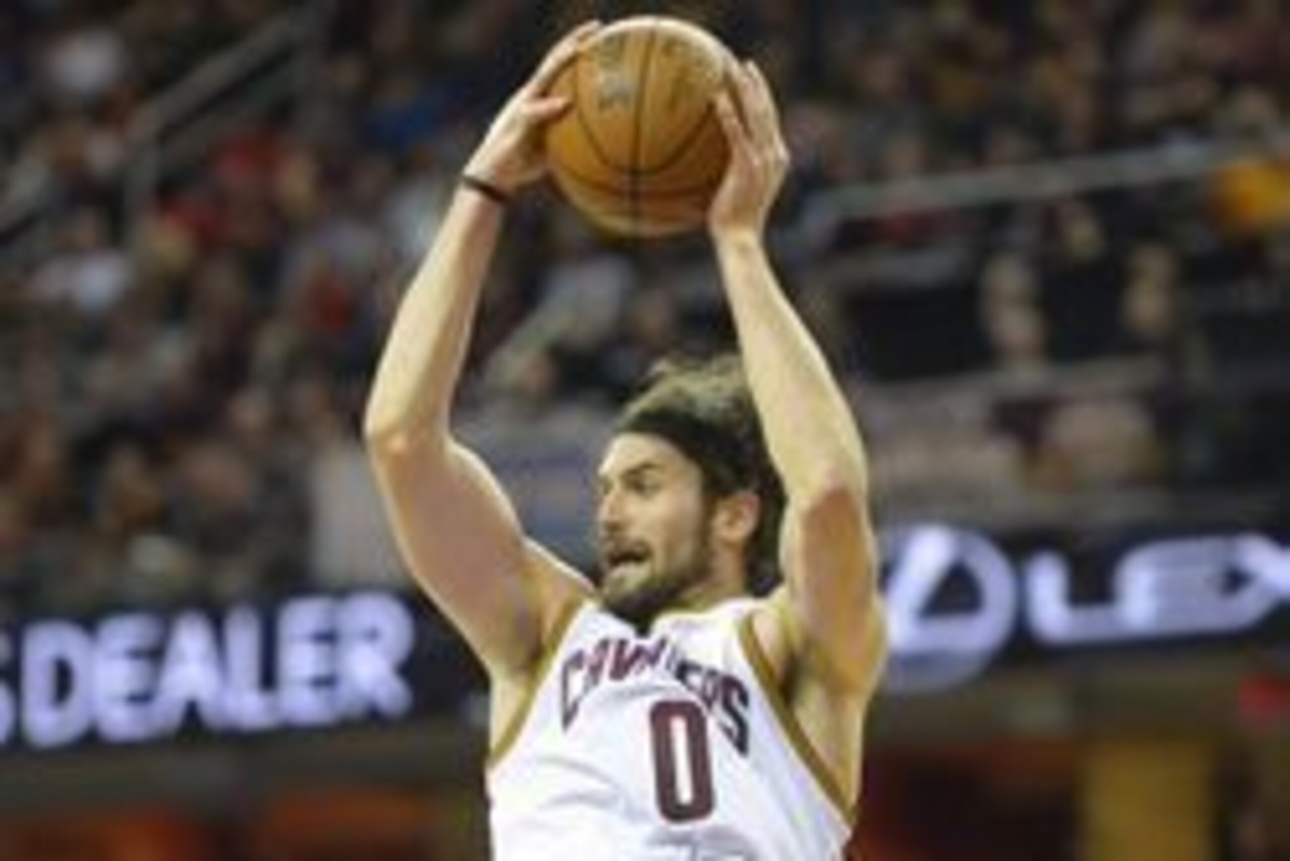 Feb 8, 2016; Cleveland, OH, USA; Cleveland Cavaliers forward Kevin Love (0) rebounds in the first quarter against the Sacramento Kings at Quicken Loans Arena. Mandatory Credit: David Richard-USA TODAY Sports