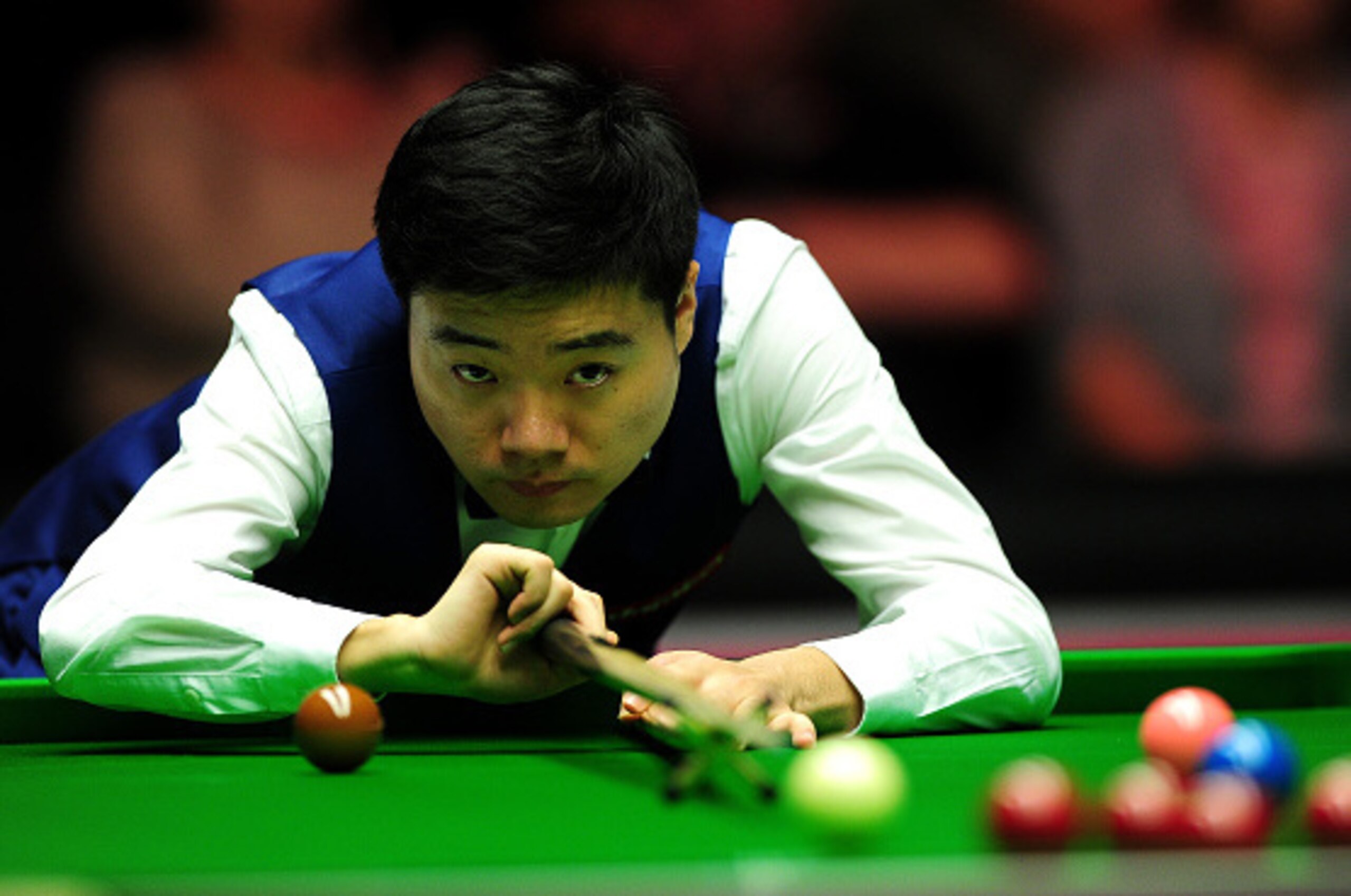 LONDON, ENGLAND - JANUARY 10:  Ding Junhui of China plays a shot against Stuart Bingham of England  during Day One of the Dafabet Masters at Alexandra Palace on January 10, 2016 in London, England.  (Photo by Dan Mullan/Getty Images)