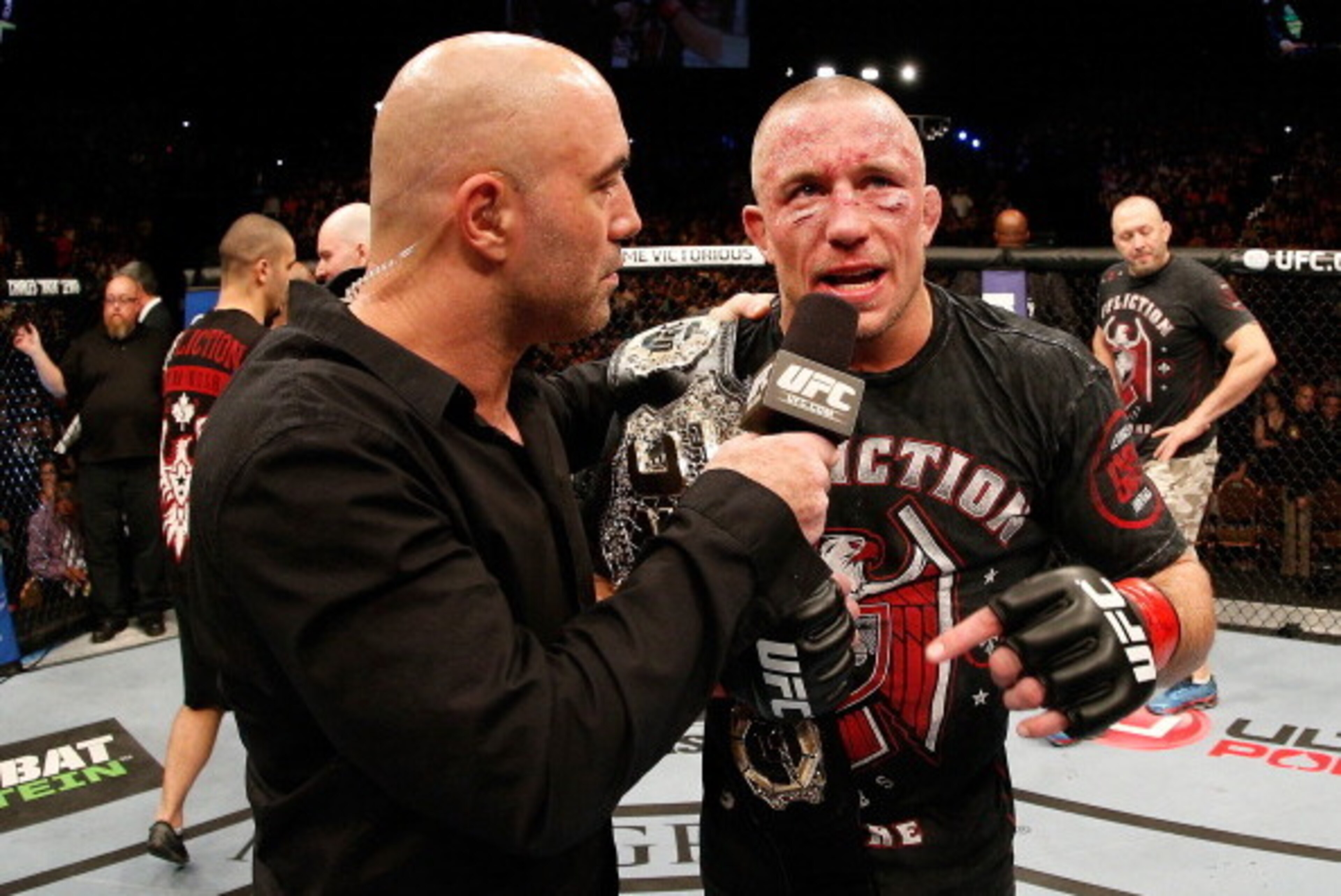 LAS VEGAS, NV - NOVEMBER 16: Georges St-Pierre (right) is interviewed by Joe Rogan (left) during the UFC 167 event inside the MGM Grand Garden Arena on November 16, 2013 in Las Vegas, Nevada. (Photo by Josh Hedges/Zuffa LLC/Zuffa LLC via Getty Images) LAS VEGAS, NV - NOVEMBER 16: Georges St-Pierre (right) is interviewed by Joe Rogan (left) during the UFC 167 event inside the MGM Grand Garden Arena on November 16, 2013 in Las Vegas, Nevada. (Photo by Josh Hedges/Zuffa LLC/Zuffa LLC via Getty Images)