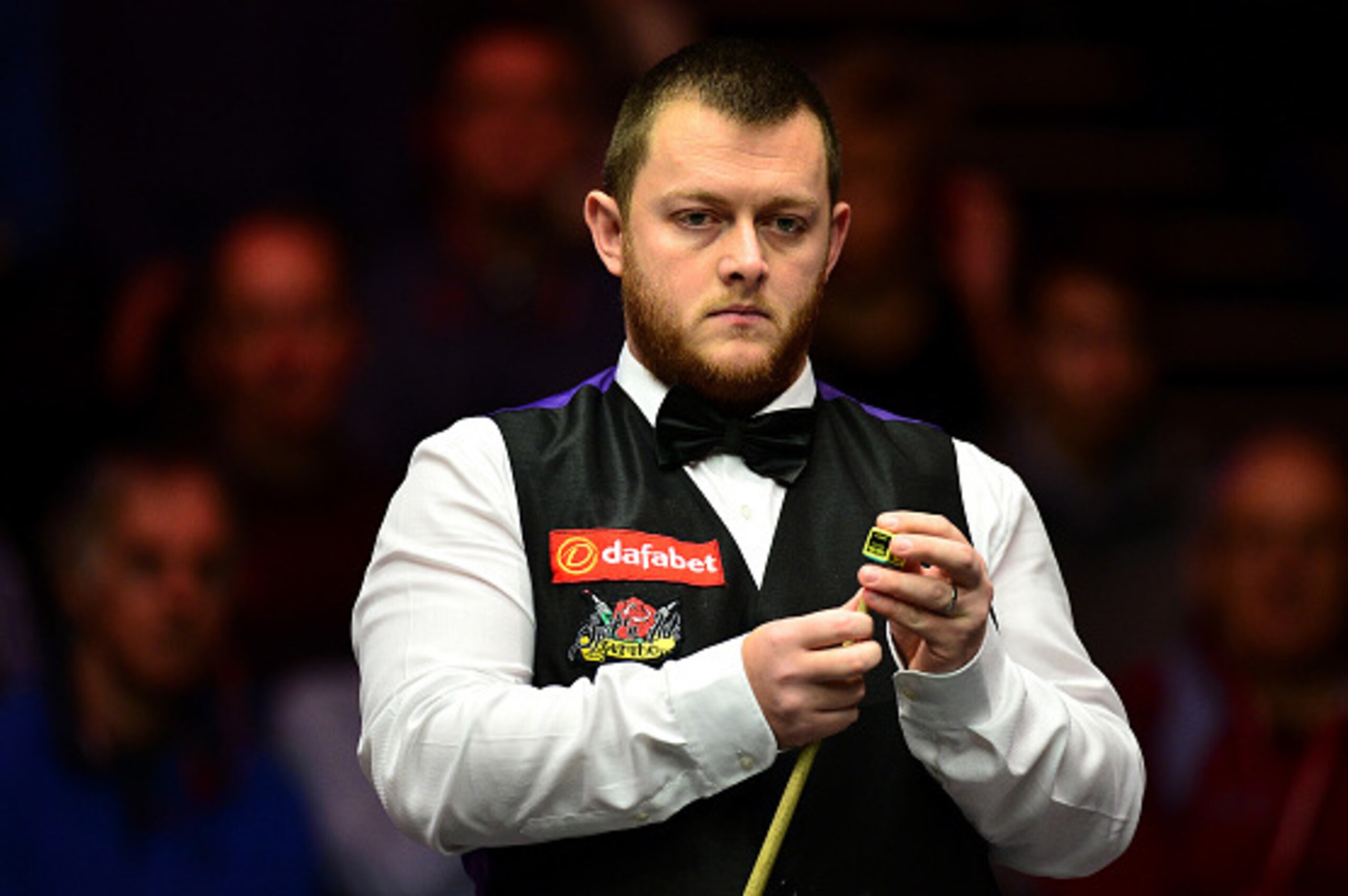 LONDON, ENGLAND - JANUARY 14:  Mark Allen of Northern Ireland looks on during his quarter final match against Barry Hawkins of England during day five of The Dafabet Masters at Alexandra Palace on January 14, 2016 in London, England.  (Photo by Dan Mullan