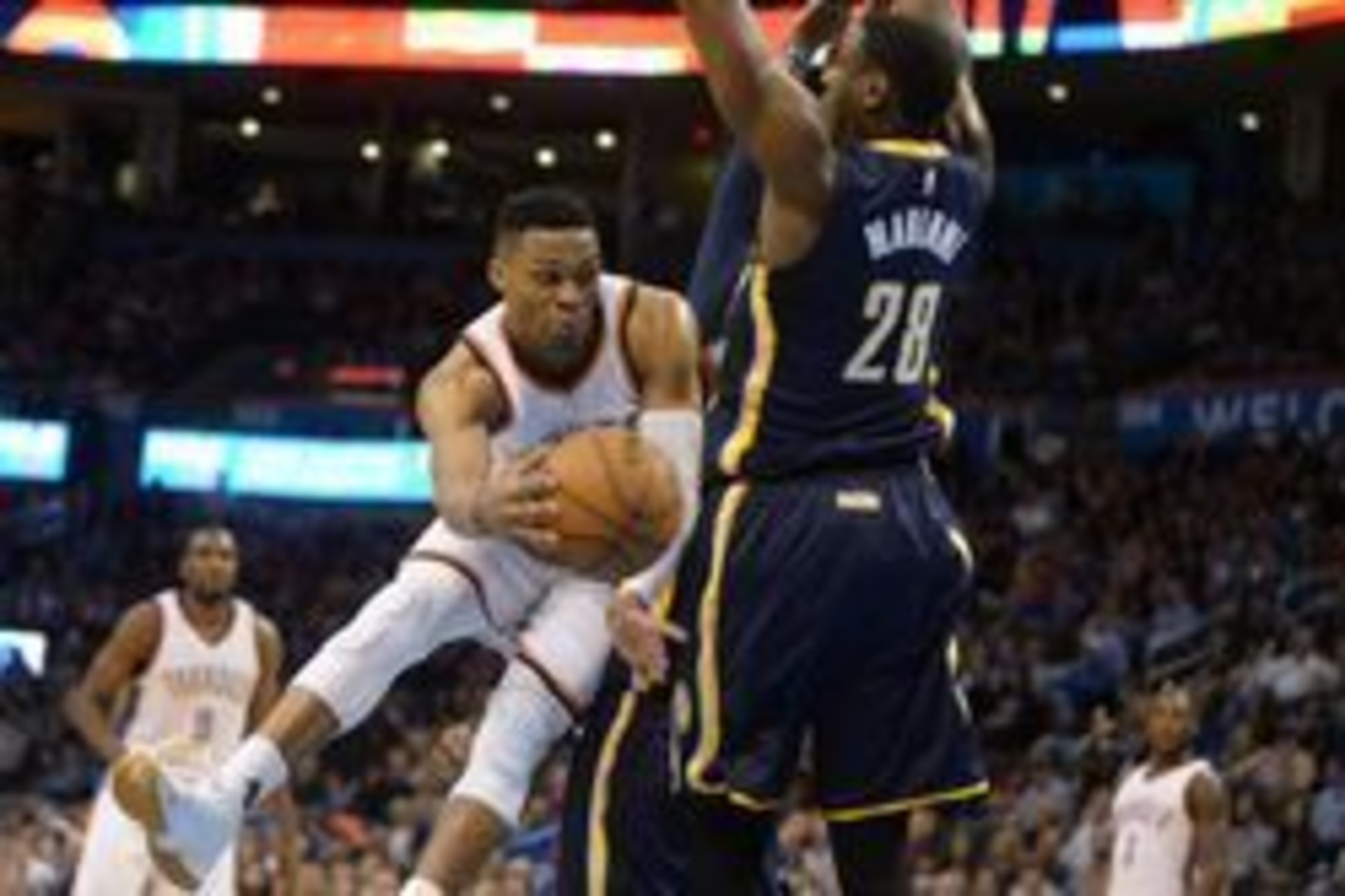 Feb 19, 2016; Oklahoma City, OK, USA; Oklahoma City Thunder guard Russell Westbrook (0) passes the ball behind Indiana Pacers center Ian Mahinmi (28) during the first quarter at Chesapeake Energy Arena. Mandatory Credit: Mark D. Smith-USA TODAY Sports Feb 19, 2016; Oklahoma City, OK, USA; Oklahoma City Thunder guard Russell Westbrook (0) passes the ball behind Indiana Pacers center Ian Mahinmi (28) during the first quarter at Chesapeake Energy Arena. Mandatory Credit: Mark D. Smith-USA TODAY Sports