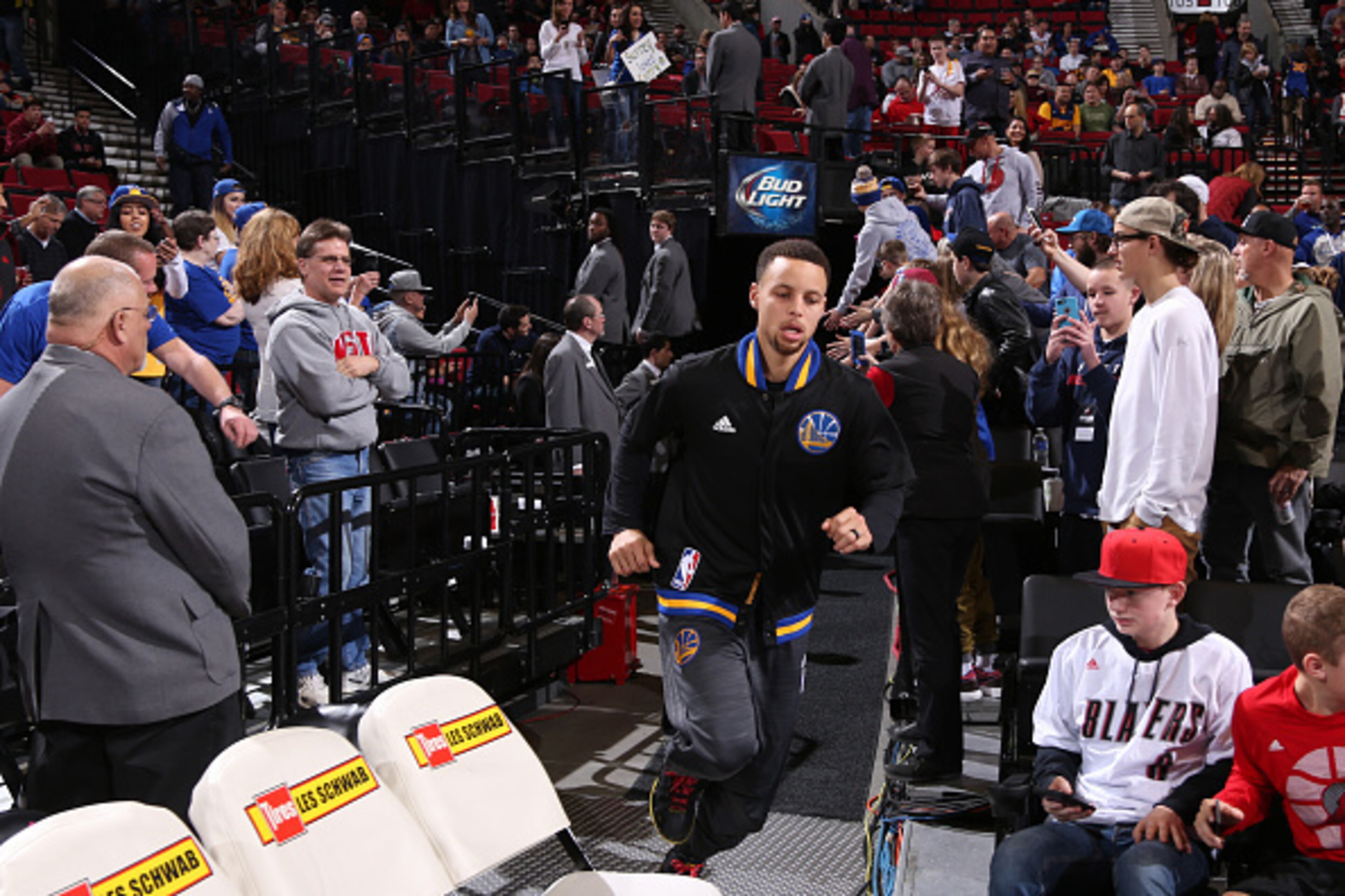 PORTLAND, OR - FEBRUARY 19: Stephen Curry #30 of the Golden State Warriors is introduced before the game against the Portland Trail Blazers on February 19, 2016 at the Moda Center in Portland, Oregon. NOTE TO USER: User expressly acknowledges and agrees t PORTLAND, OR - FEBRUARY 19: Stephen Curry #30 of the Golden State Warriors is introduced before the game against the Portland Trail Blazers on February 19, 2016 at the Moda Center in Portland, Oregon. NOTE TO USER: User expressly acknowledges and agrees t