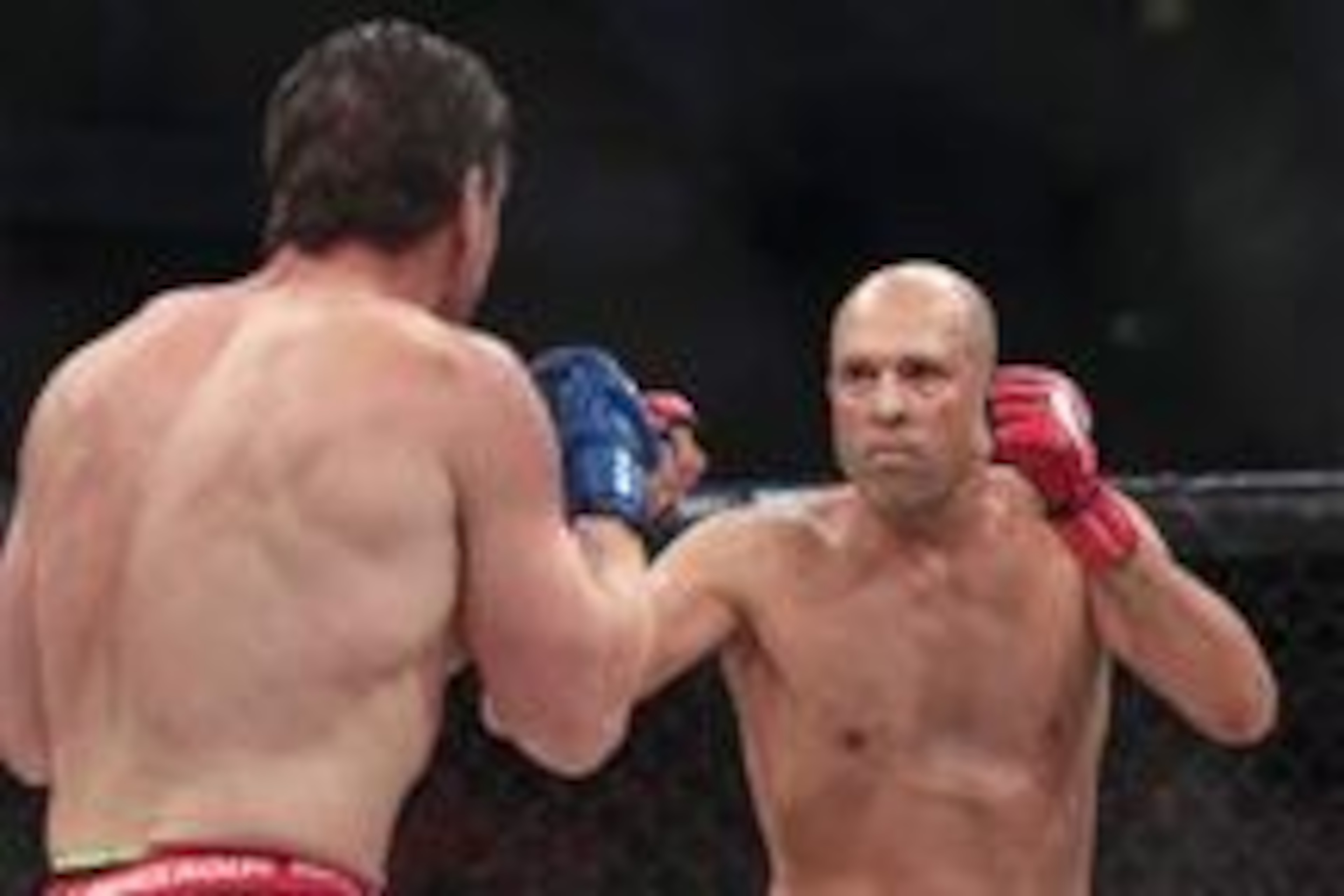 Feb 19, 2016; Houston, TX, USA; Royce Gracie (red gloves) competes against Ken Shamrock (blue gloves) during their main event fight at Bellator 149 at Toyota Center. Mandatory Credit: Troy Taormina-USA TODAY Sports