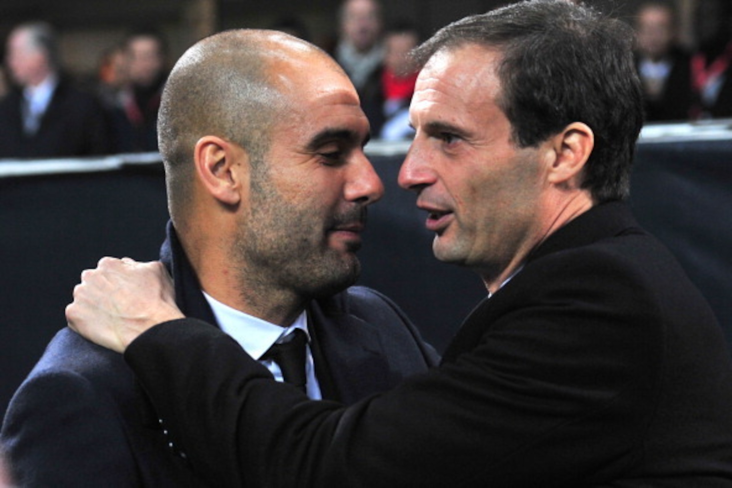 Barcelona's coach Josep Guardiola (L) and AC Milan's coach Massimiliano Allegri hug before the Champions League group H football match AC Milan vs FC Barcelona on November 23, 2011 at San Siro stadium in Milan. AFP PHOTO / GIUSEPPE CACACE (Photo credit s Barcelona's coach Josep Guardiola (L) and AC Milan's coach Massimiliano Allegri hug before the Champions League group H football match AC Milan vs FC Barcelona on November 23, 2011 at San Siro stadium in Milan. AFP PHOTO / GIUSEPPE CACACE (Photo credit s