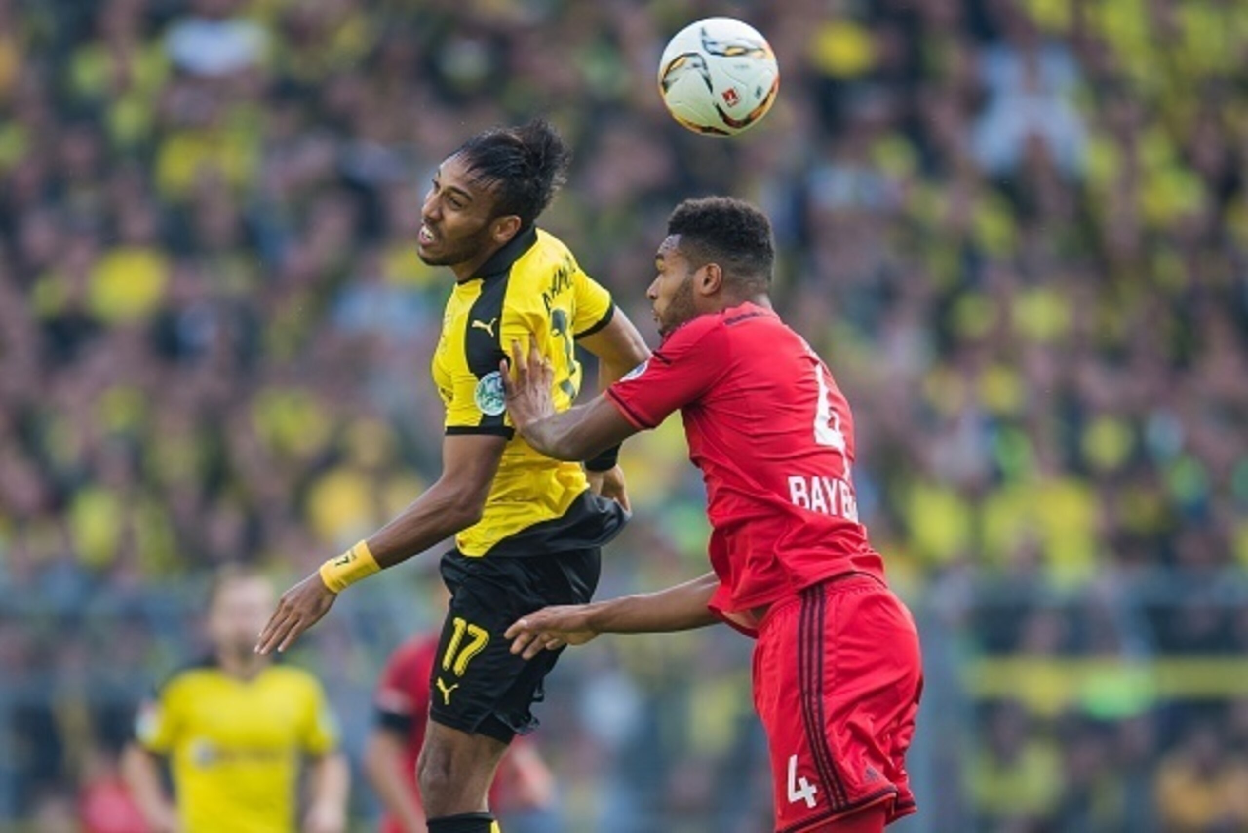 (L-R) Pierre-Emerick Aubameyang of Borussia Dortmund, Jonathan Tah of Bayer 04 Leverkusen during the Bundesliga match between Borussia Dortmund and Bayer 04 Leverkusen on September 20, 2015 at the Signal Iduna Park in Dortmund, Germany.(Photo by VI Images (L-R) Pierre-Emerick Aubameyang of Borussia Dortmund, Jonathan Tah of Bayer 04 Leverkusen during the Bundesliga match between Borussia Dortmund and Bayer 04 Leverkusen on September 20, 2015 at the Signal Iduna Park in Dortmund, Germany.(Photo by VI Images
