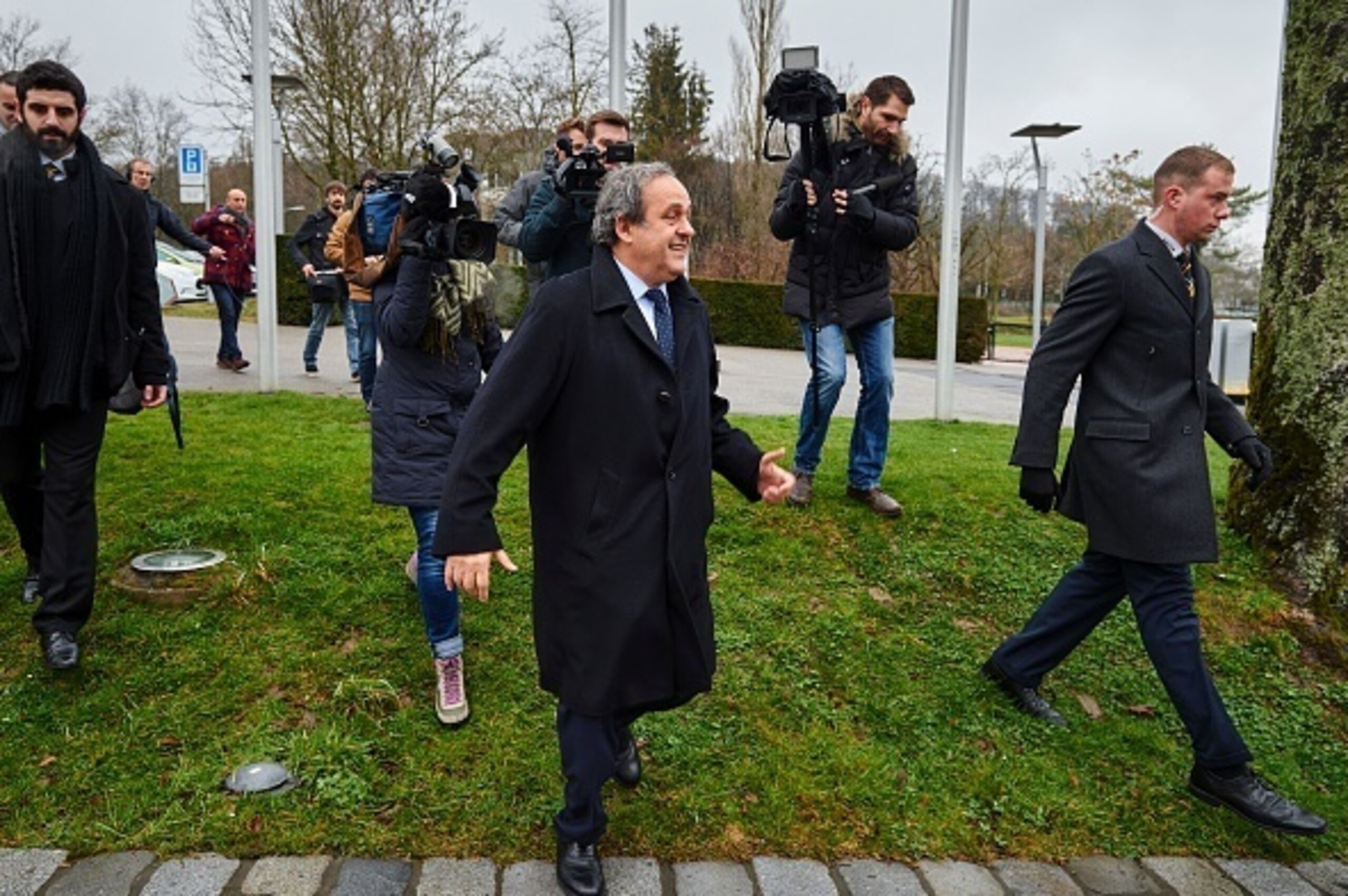Suspended UEFA president Michel Platini (C), followed by journalists, arrives to attend his appeal against a eight year ban from football on February 15, 2016 at the FIFA headquarters in Zurich.
The 60-year-old Frenchman was banned for eight years on De Suspended UEFA president Michel Platini (C), followed by journalists, arrives to attend his appeal against a eight year ban from football on February 15, 2016 at the FIFA headquarters in Zurich.
The 60-year-old Frenchman was banned for eight years on De