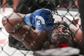 Feb 19, 2016; Houston, TX, USA; Dada 5000 (blue gloves) after a TKO during his Heavyweight fight against Kimbo Slice (not pictured) at Bellator 149 at Toyota Center. Mandatory Credit: Troy Taormina-USA TODAY Sports