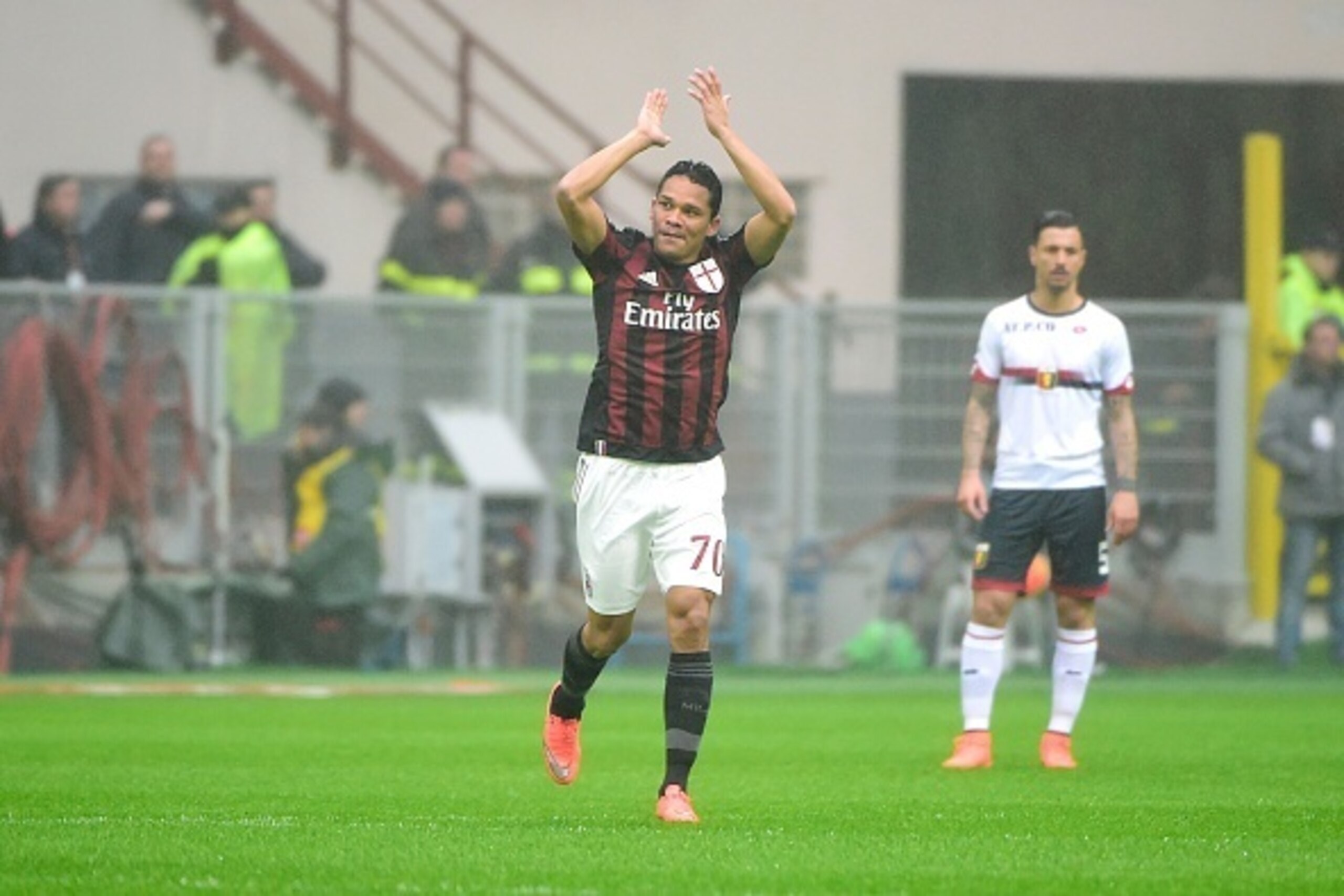 AC Milan's forward from Colombia Carlos Bacca celebrates after scoring during the Italian Serie A football match AC Milan vs Genoa on February 14, 2016 at the San Siro Stadium stadium in Milan.  / AFP / OLIVIER MORIN        (Photo credit should read OLIVI