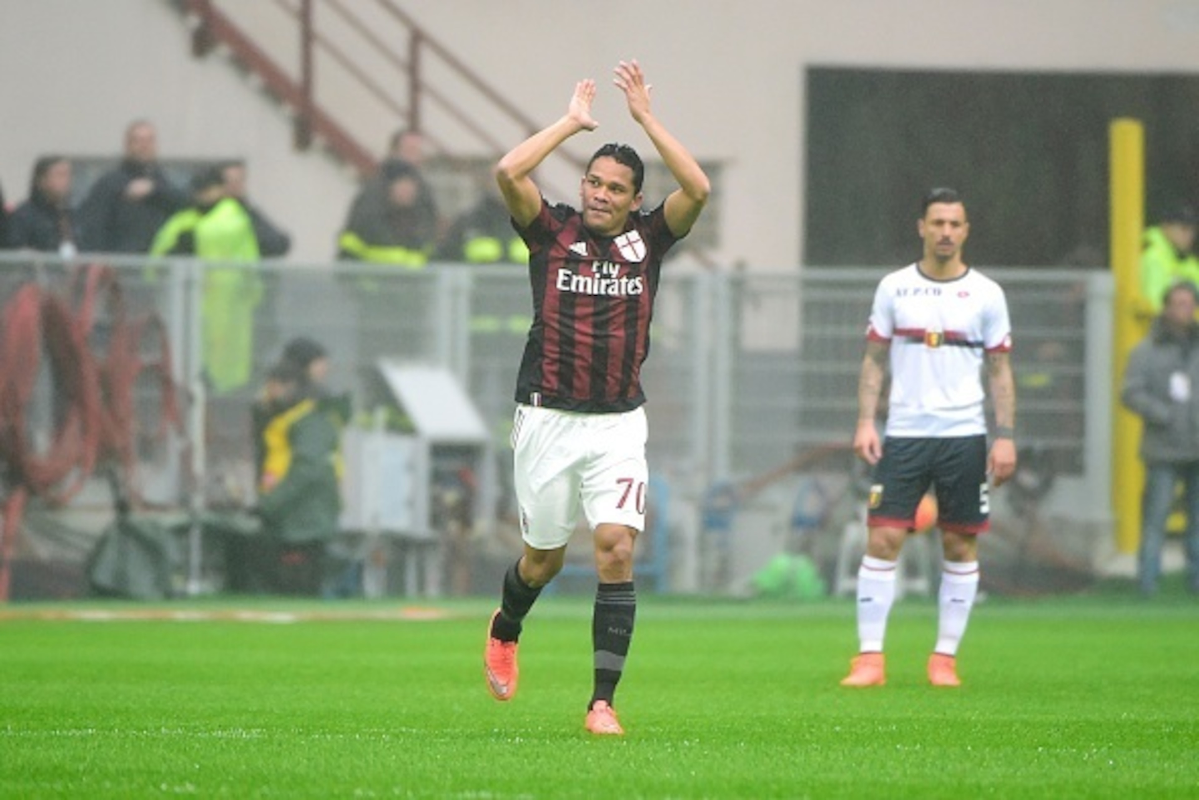 AC Milan's forward from Colombia Carlos Bacca celebrates after scoring during the Italian Serie A football match AC Milan vs Genoa on February 14, 2016 at the San Siro Stadium stadium in Milan.  / AFP / OLIVIER MORIN        (Photo credit should read OLIVI